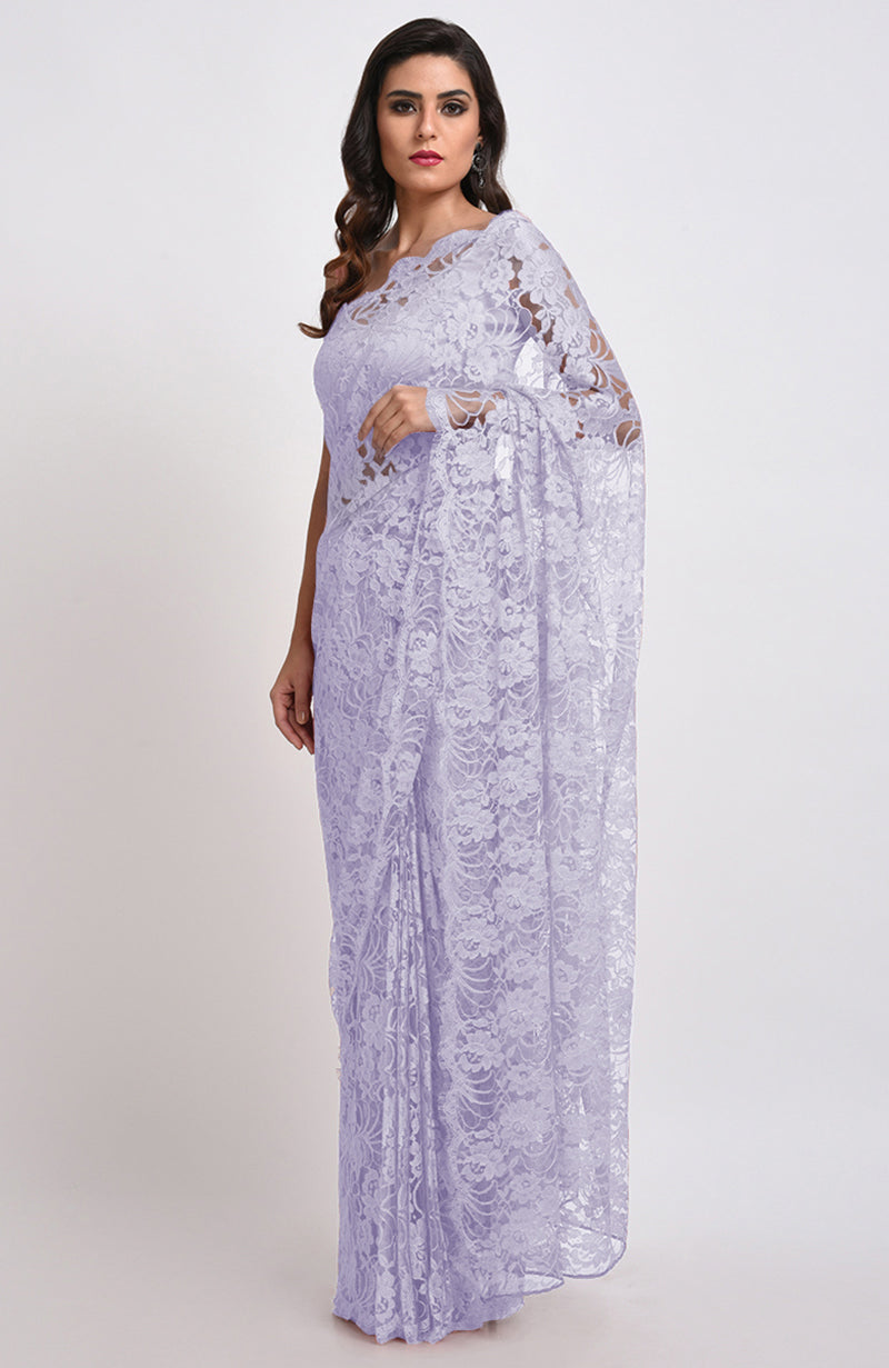 Light lilac Chantilly lace saree set with a matching blouse.