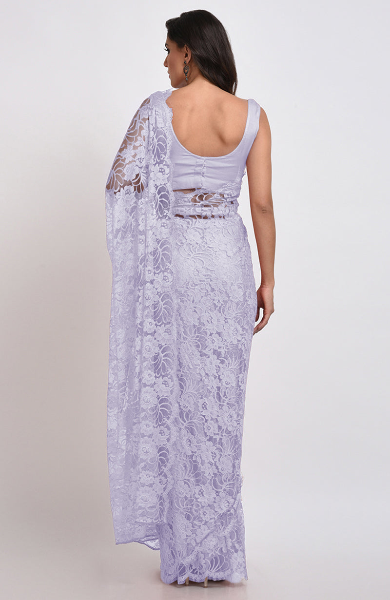 Light lilac Chantilly lace saree set with a matching satin blouse.