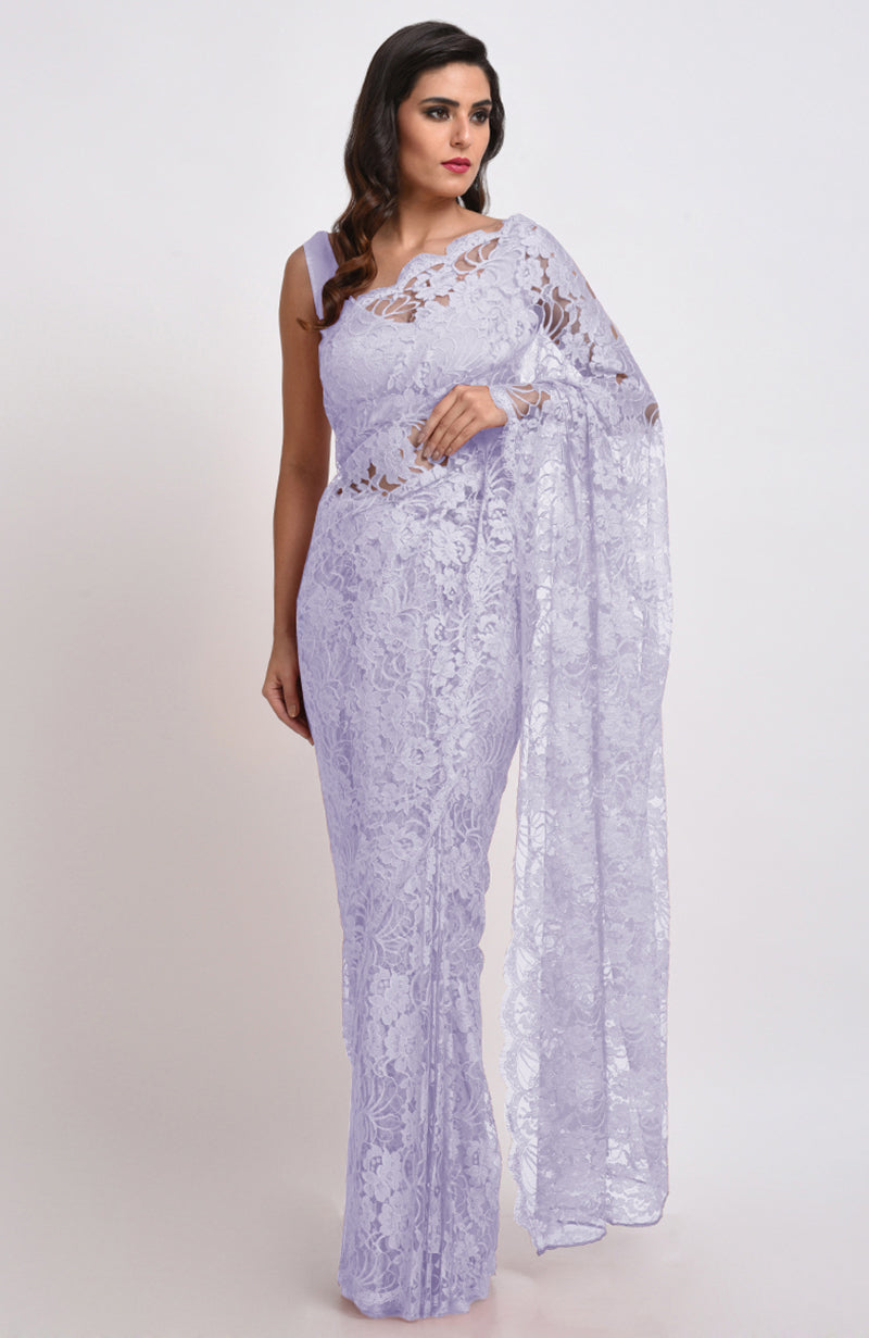 Light lilac Chantilly lace saree set with a matching satin blouse.