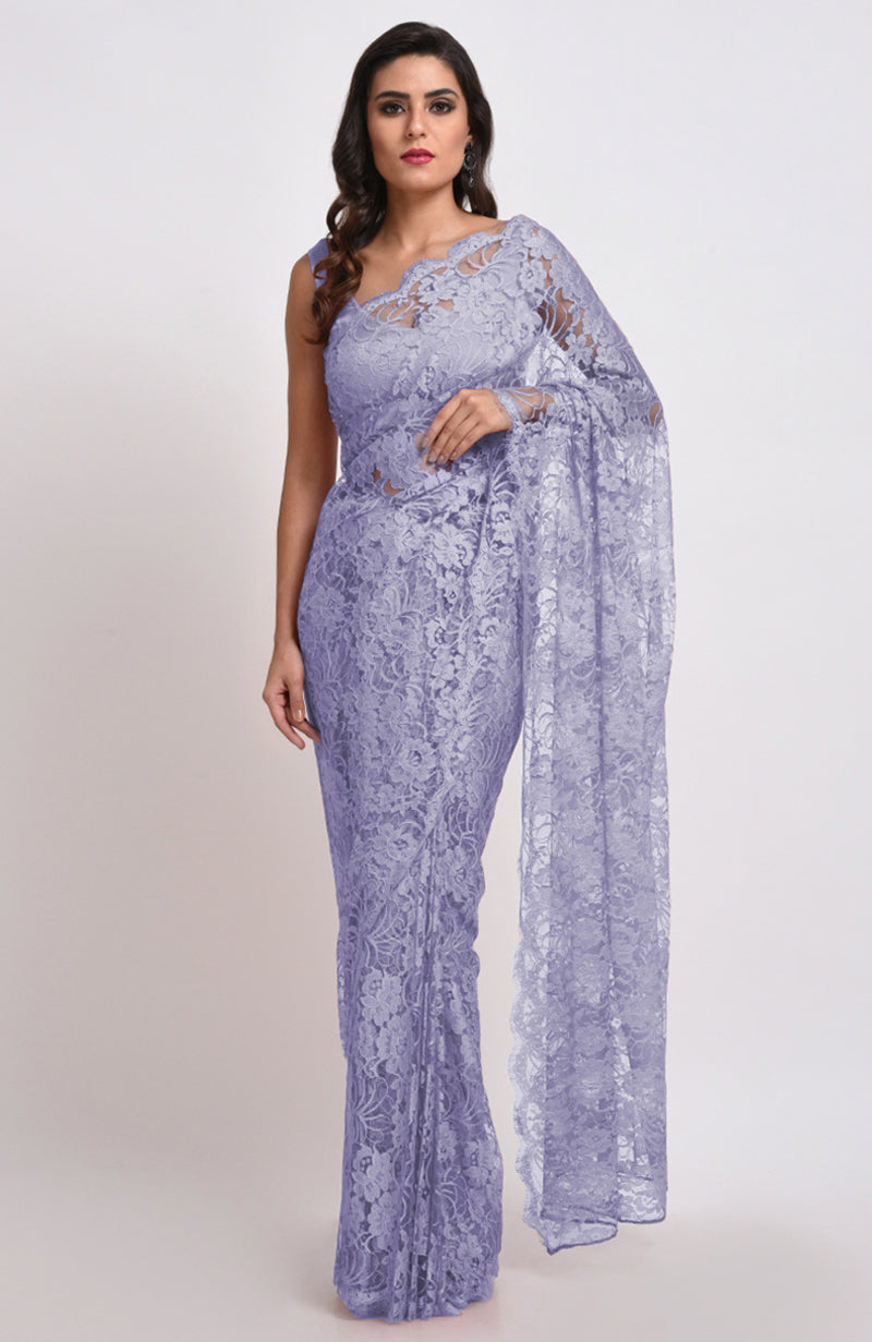 Light purple Chantilly lace saree with a matching blouse.
