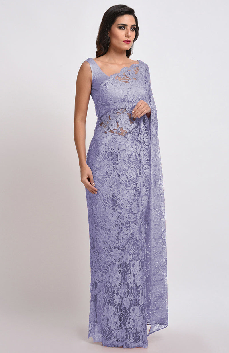 Light purple Chantilly lace saree set with a matching blouse.