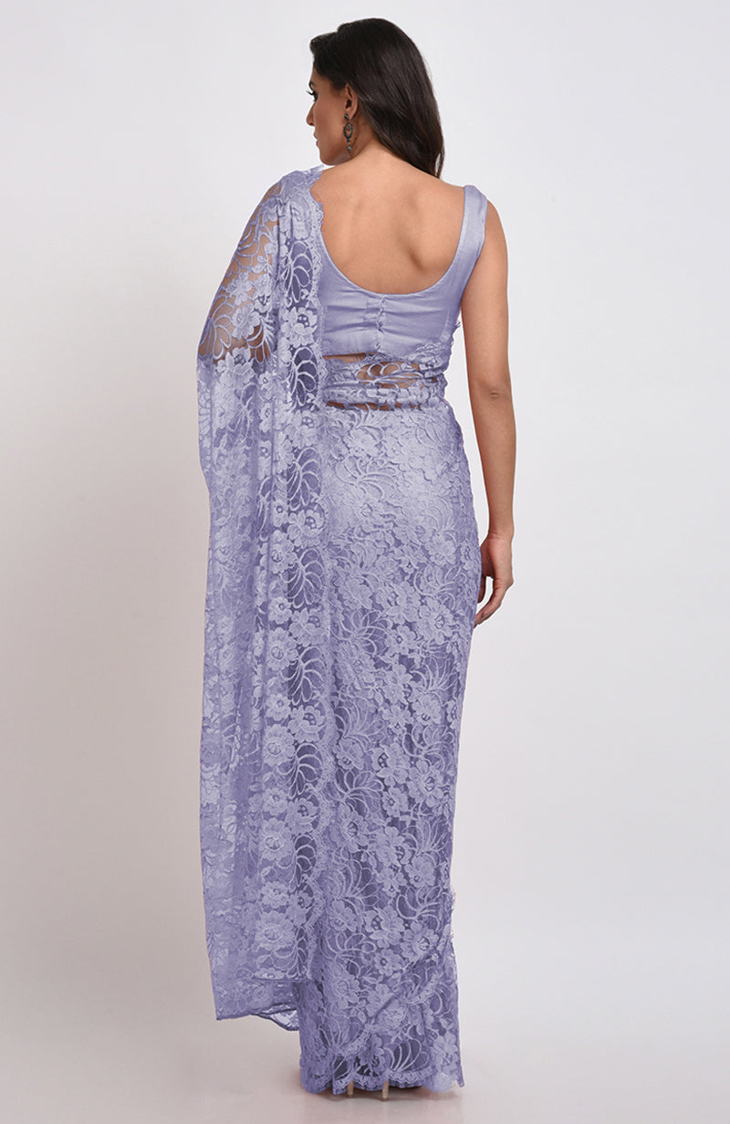 Light purple Chantilly lace saree set with a matching blouse, viewed from the back.
