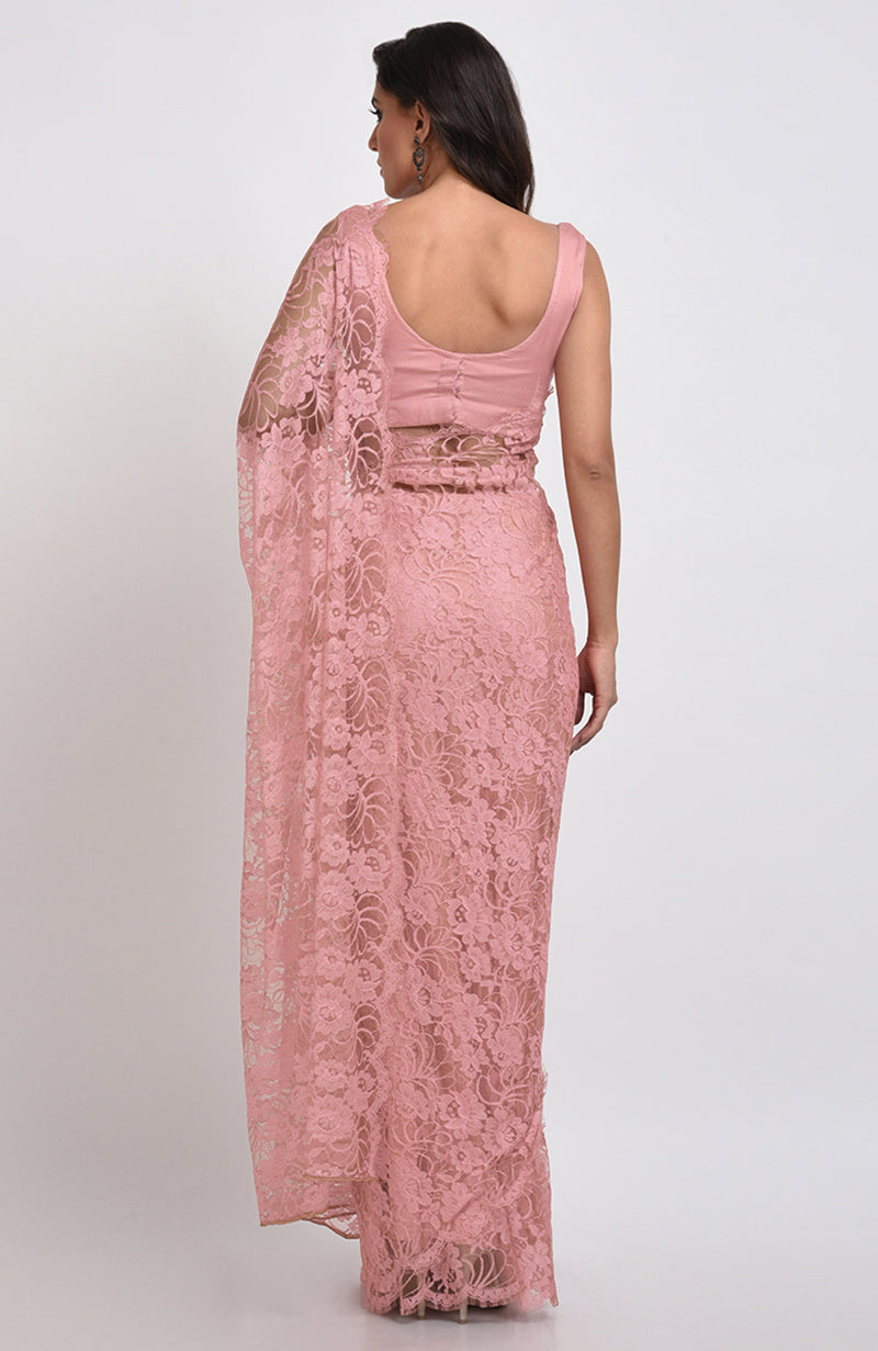 Old rose French Chantilly lace saree set with a matching blouse.