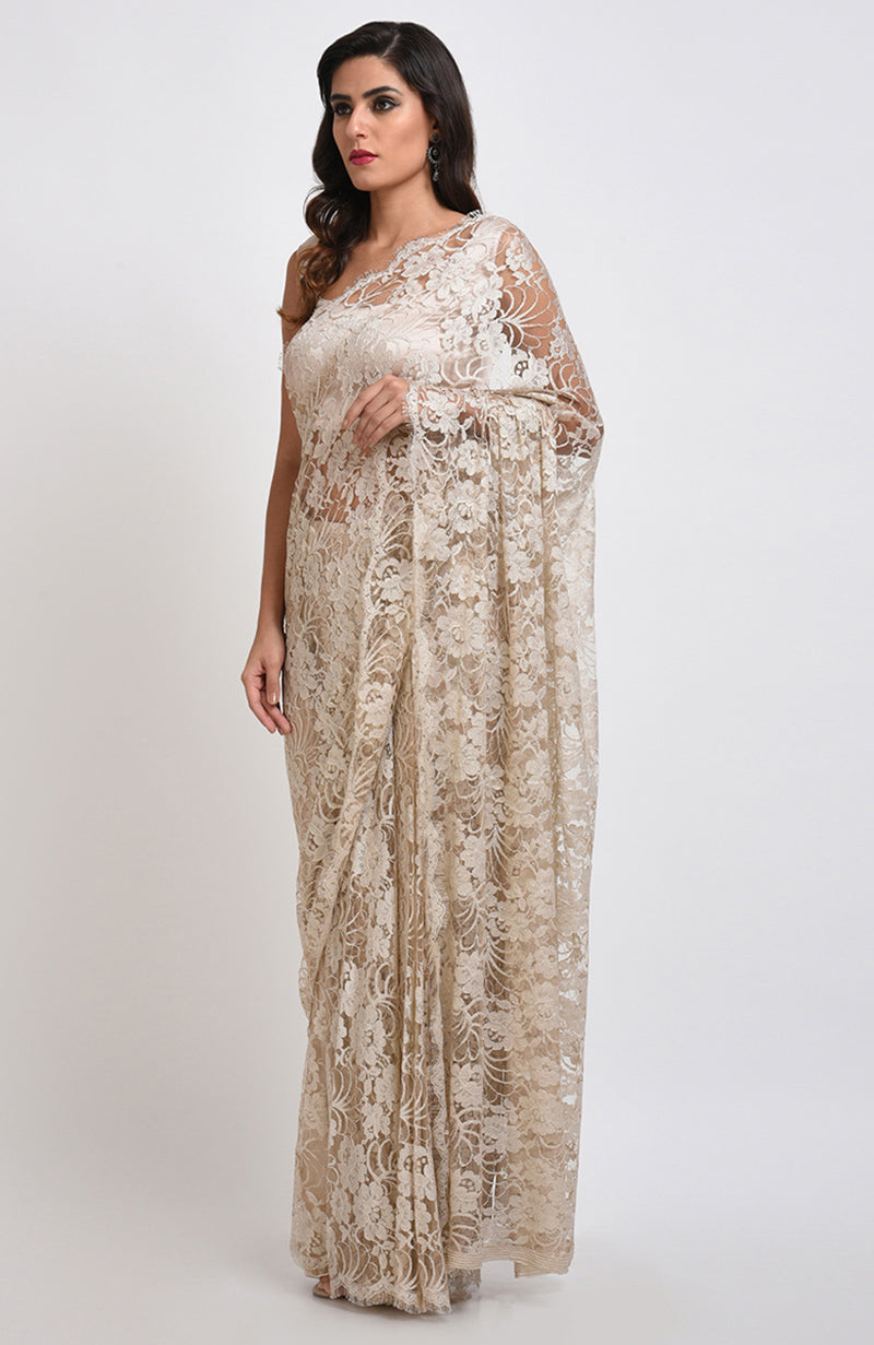 White Swan saree in white French Chantilly lace with matching plain satin blouse fabric.
