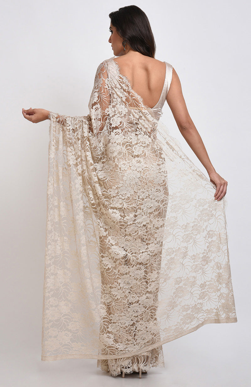 White Swan saree set in white French Chantilly lace with matching plain satin blouse fabric