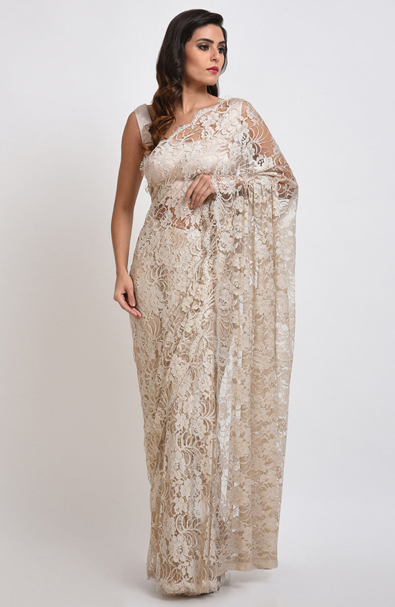 White Swan saree set in white French Chantilly lace with matching plain satin blouse fabric.