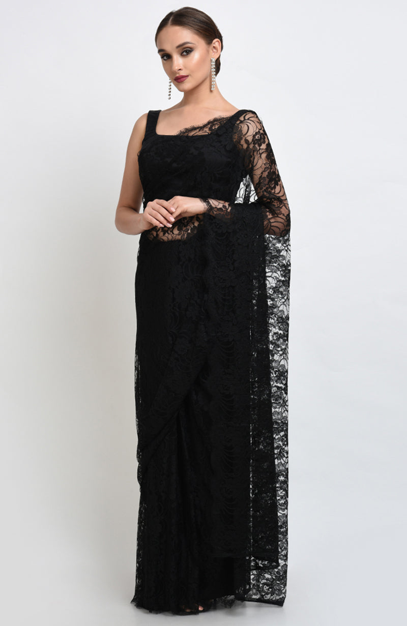 Black saree made of French Chantilly lace with matching satin blouse fabric visible