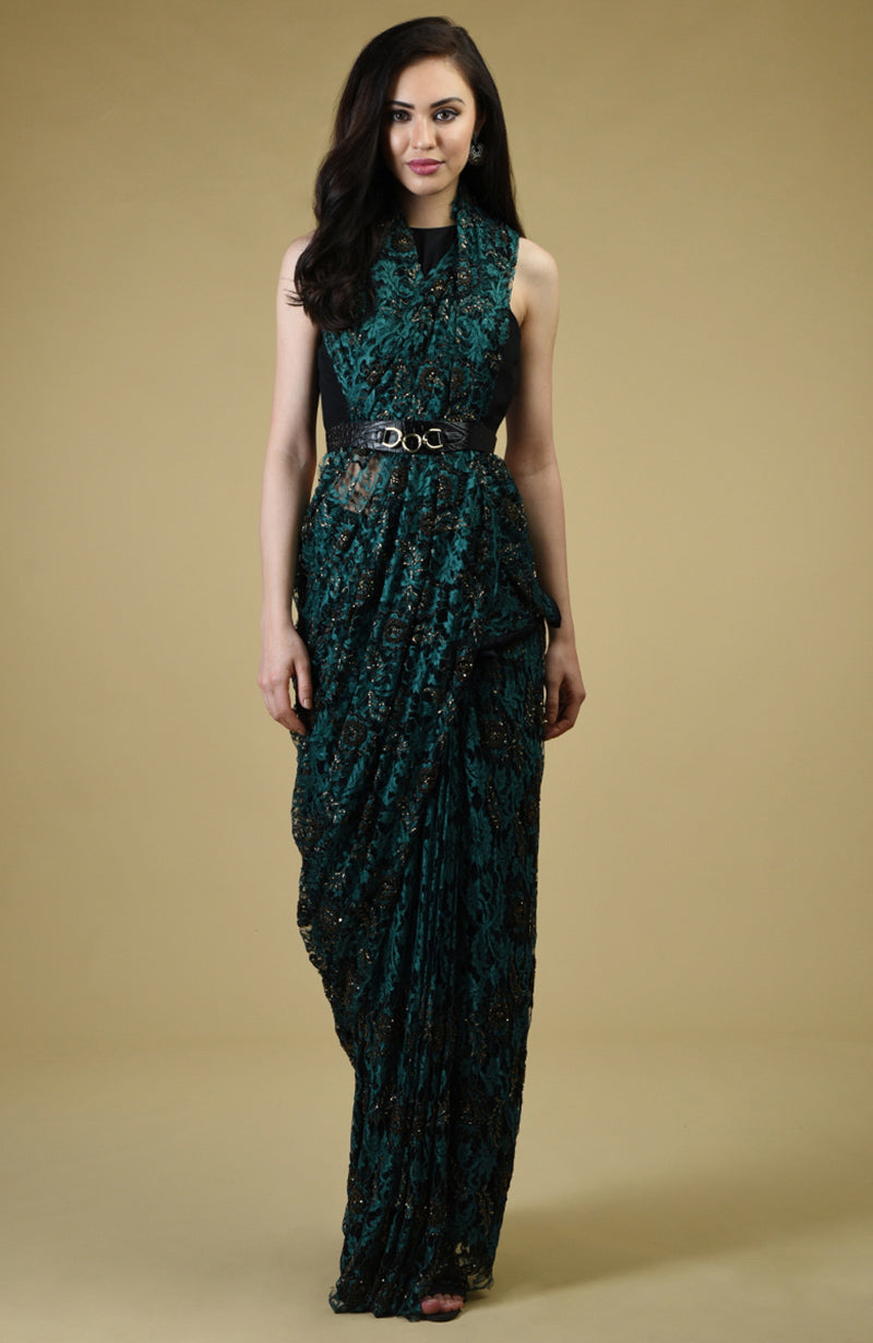 Peacock green French Chantilly lace saree with black and gold bead embroidery and matching blouse fabric