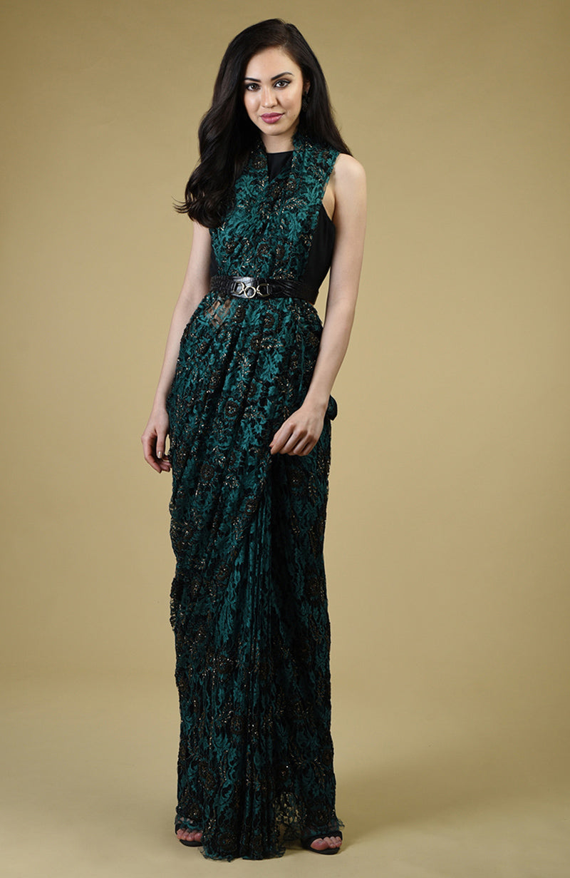 Peacock green French Chantilly lace saree with black and gold bead embroidery and matching blouse fabric