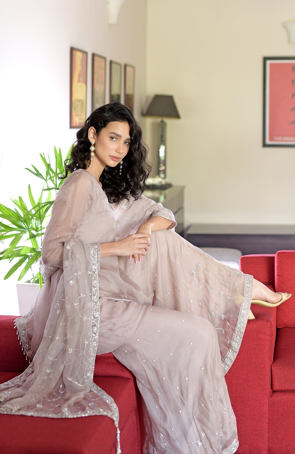 Oyster pink silk organza sharara set with hand-embroidered cut bead zardozi and beaded tassels