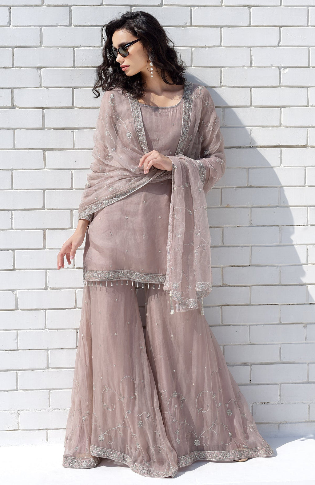 Oyster pink silk organza sharara set with hand-embroidered bead zardozi and tassels