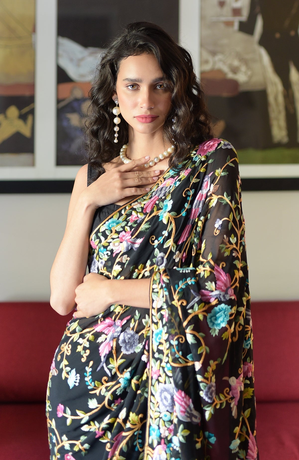 Black georgette saree with hand embroidered Parsi Gara birds and floral patterns
