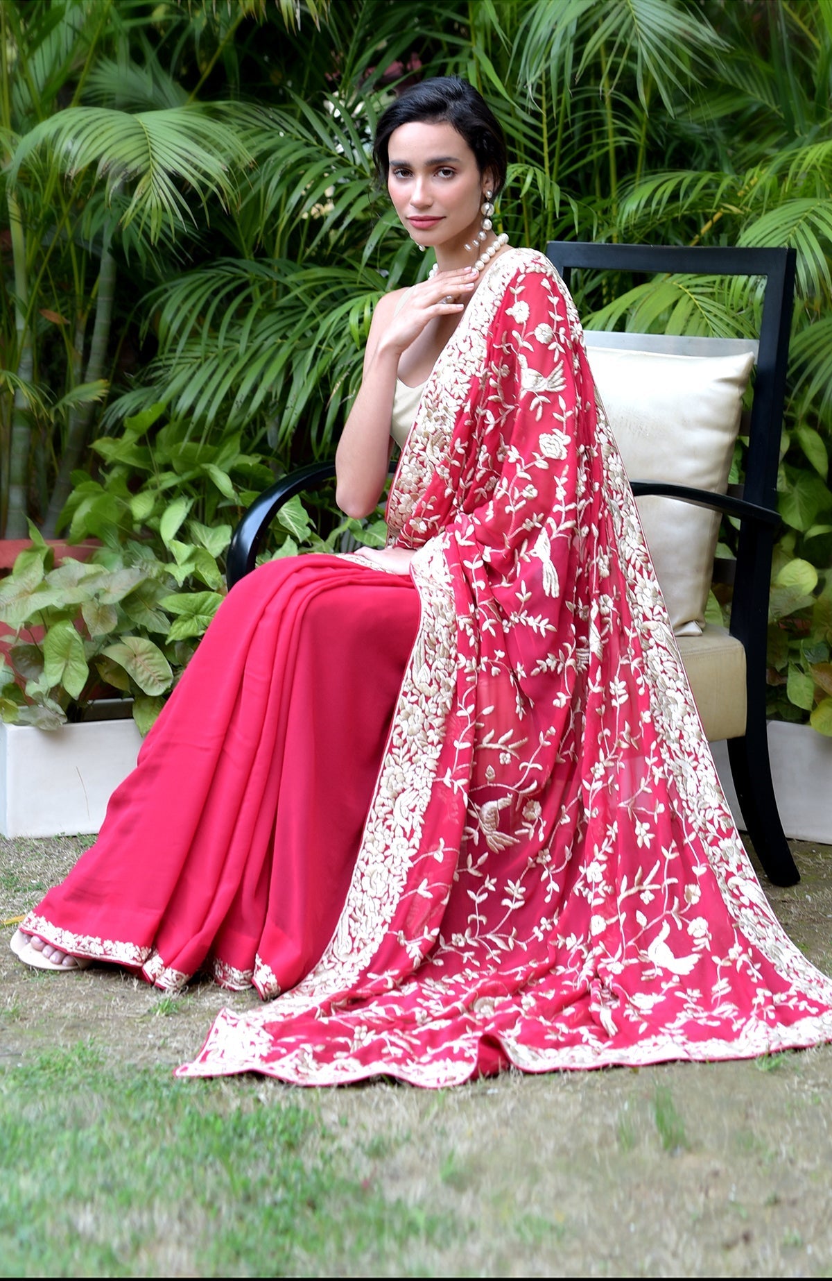 Apple red hand-embroidered Parsi Gara saree with floral and bird motifs and matching blouse piece