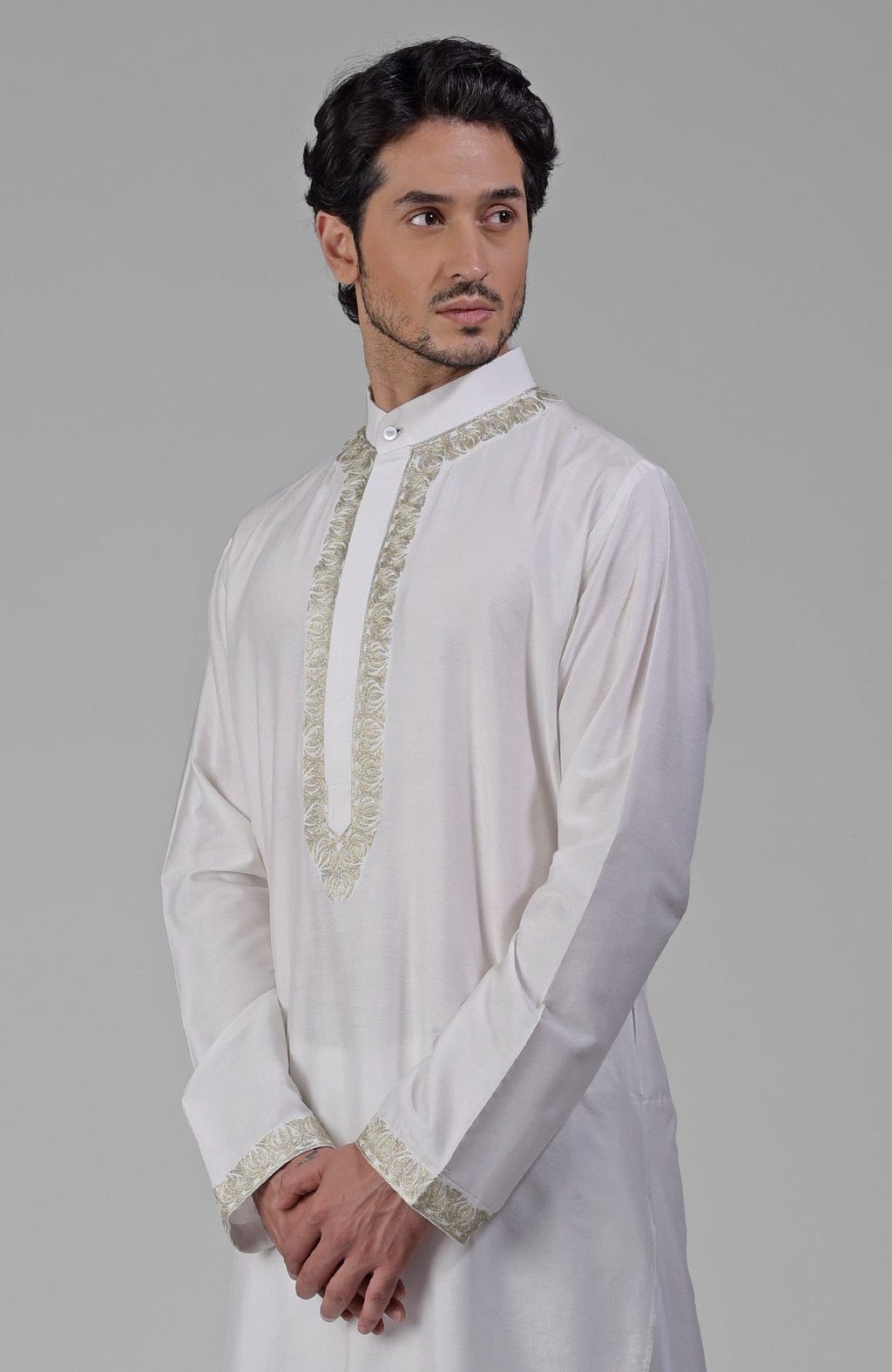 Ivory kurta set with silver and gold Kashmiri tilla embroidery on placket and sleeves.