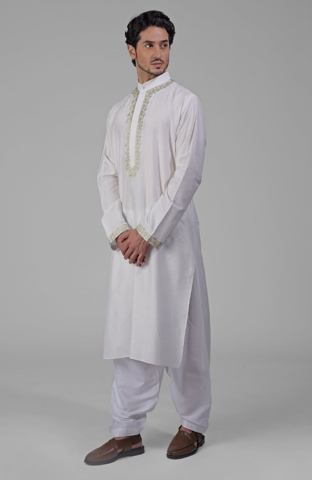 Ivory kurta set with Kashmiri tilla embroidery, silver zari placket, and band collar details