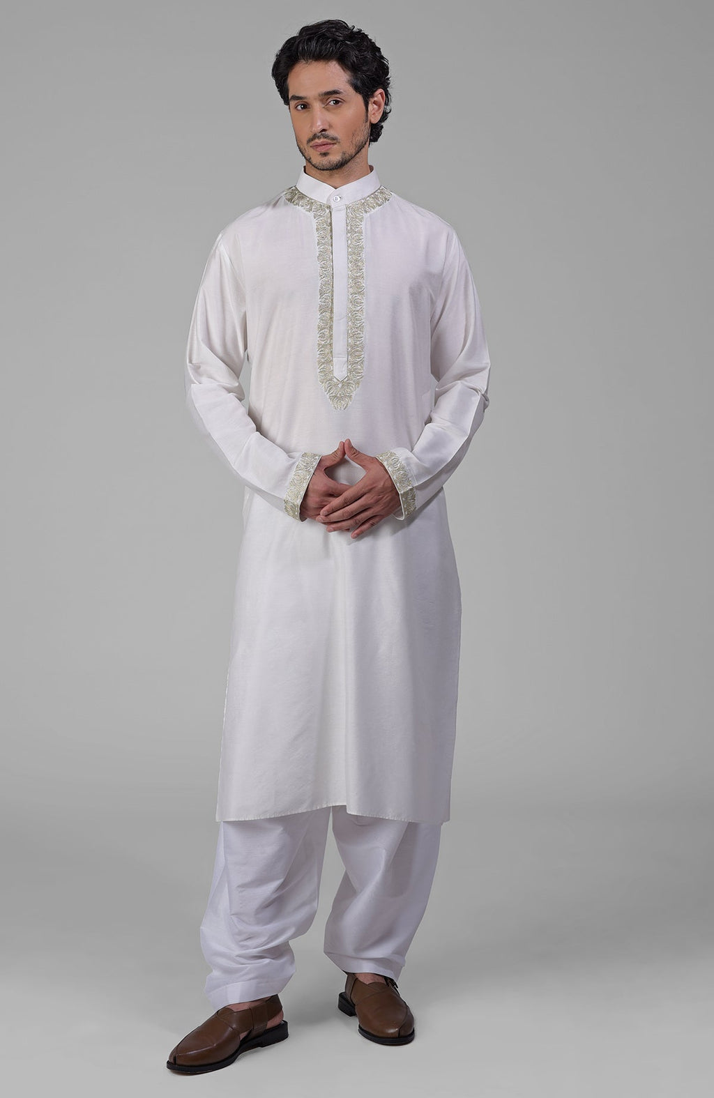 Ivory kurta set with Kashmiri tilla embroidery, silver zari placket, and band collar.