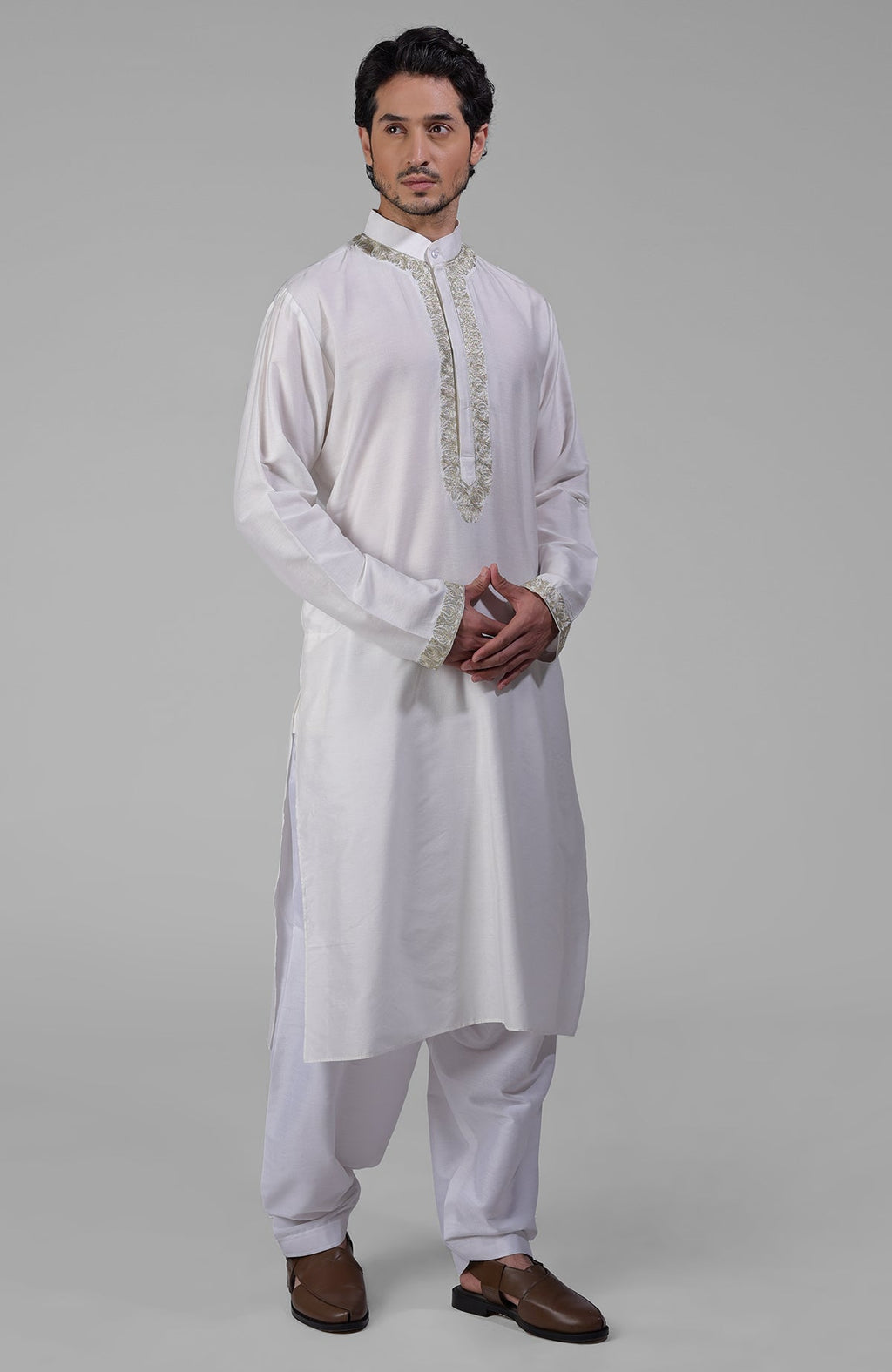 Ivory kurta set with Kashmiri tilla embroidery in silver and gold threads and band collar.