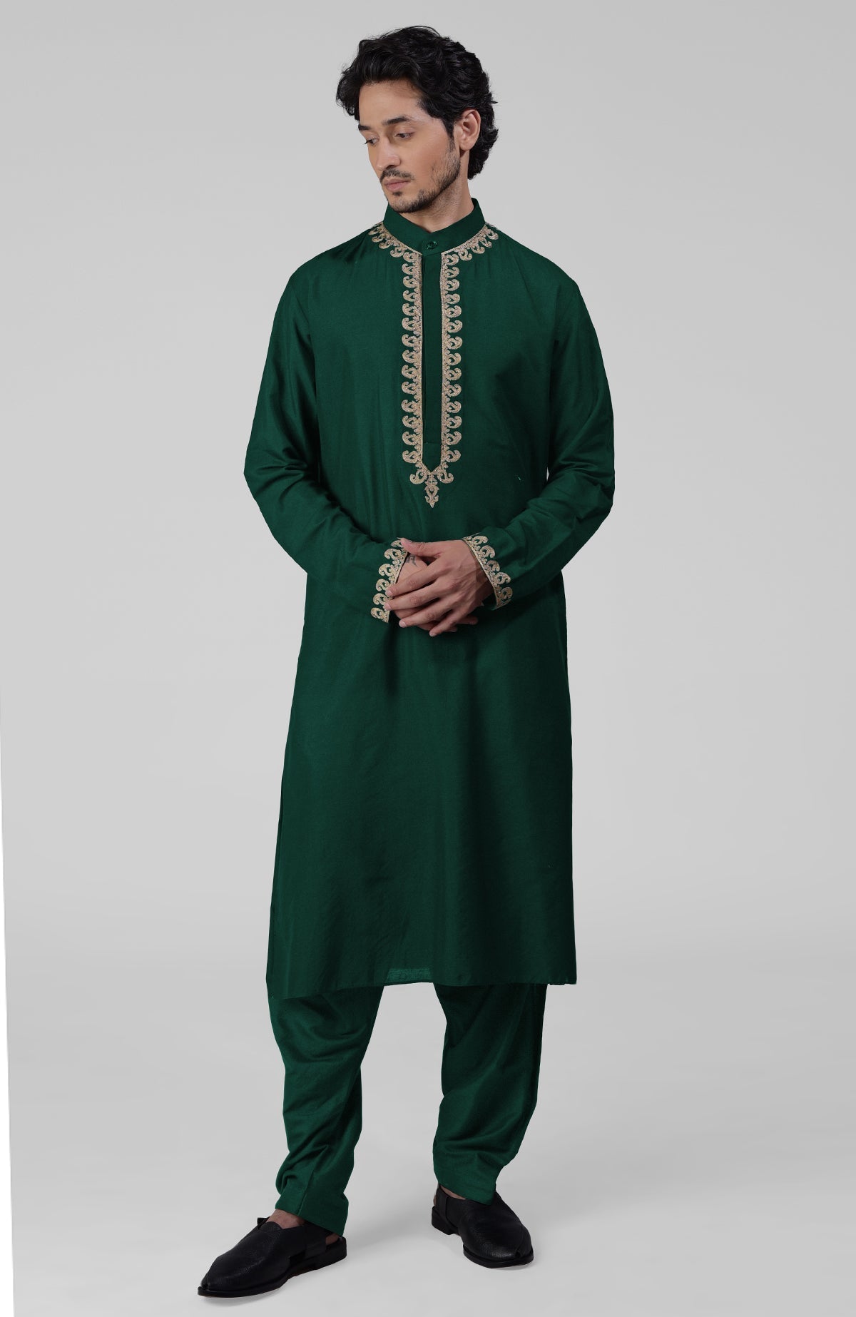 Emerald green silk kurta with gold Kashmiri tilla embroidery and matching pathani salwar set