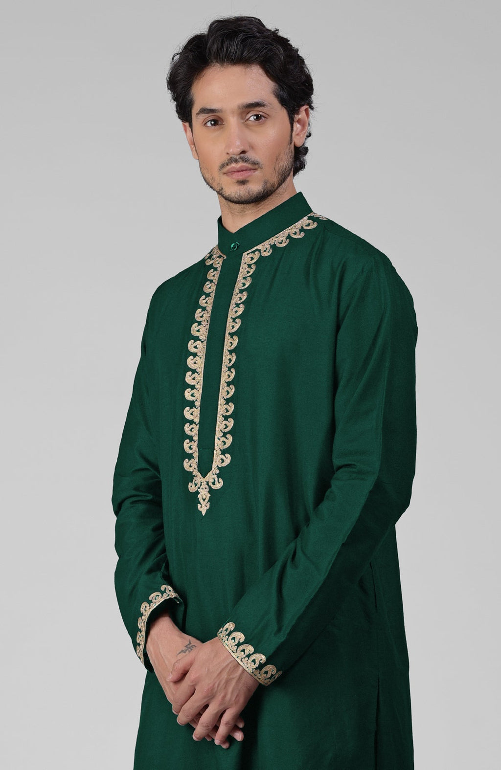 Emerald green silk kurta with gold Kashmiri tilla embroidery and matching pathani salwar set