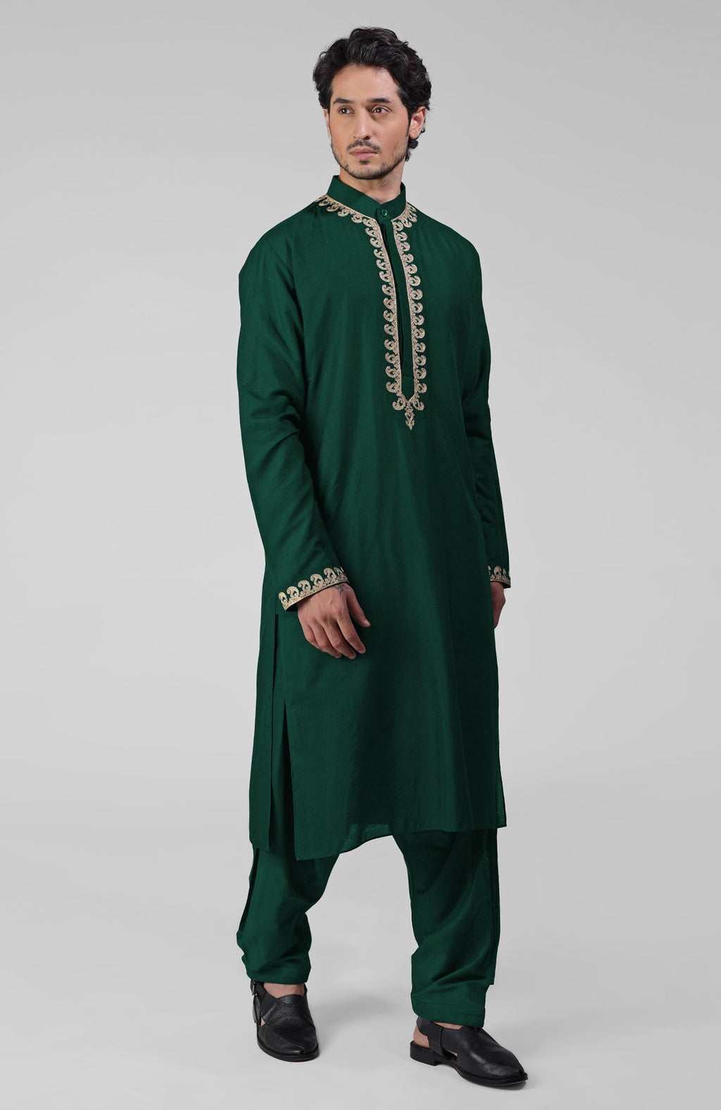 Emerald green silk kurta with gold Kashmiri tilla embroidery and matching pathani salwar set.