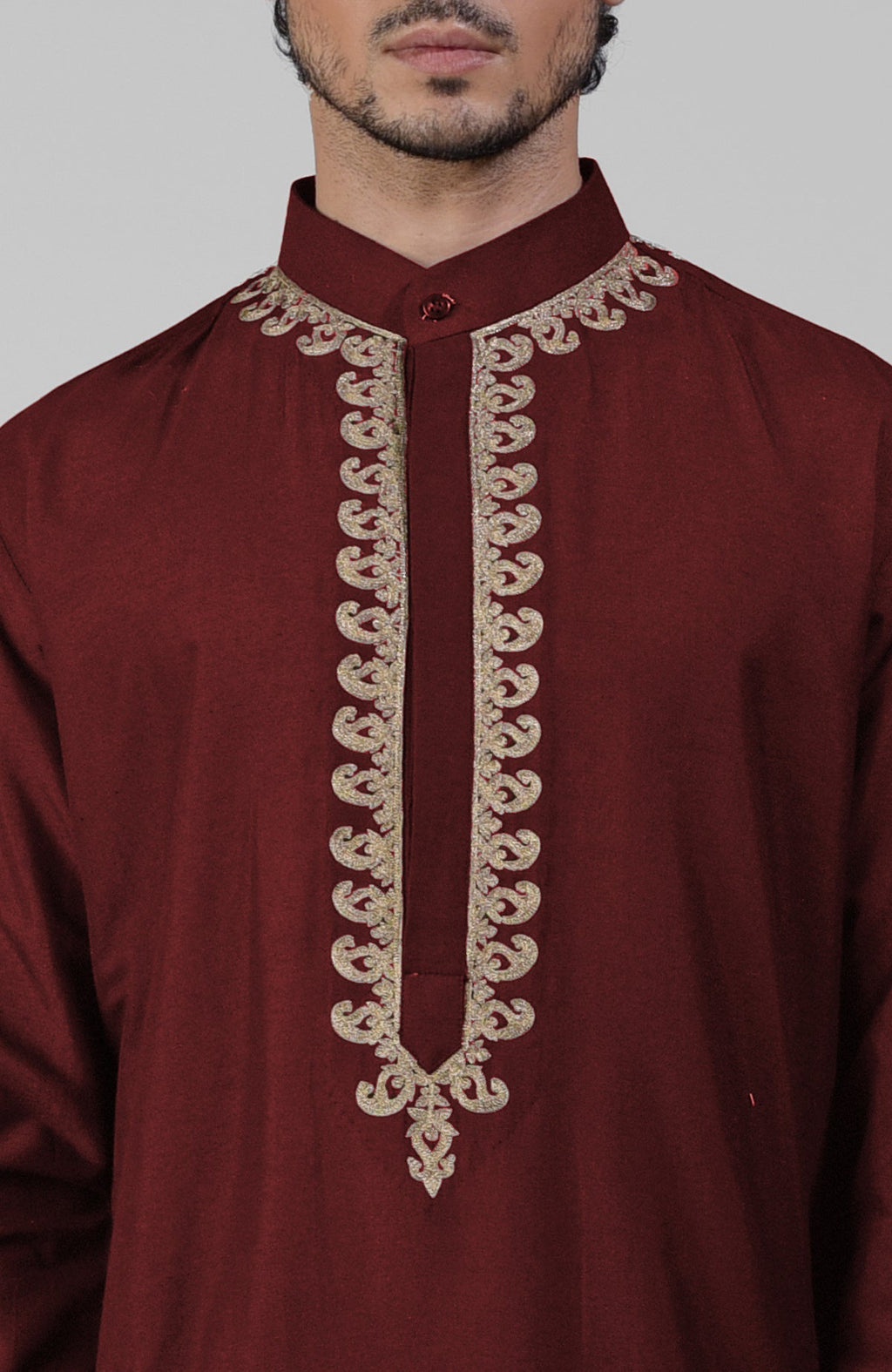 Maroon silk kurta set with intricate gold Kashmiri tilla embroidery and matching pathani salwar.