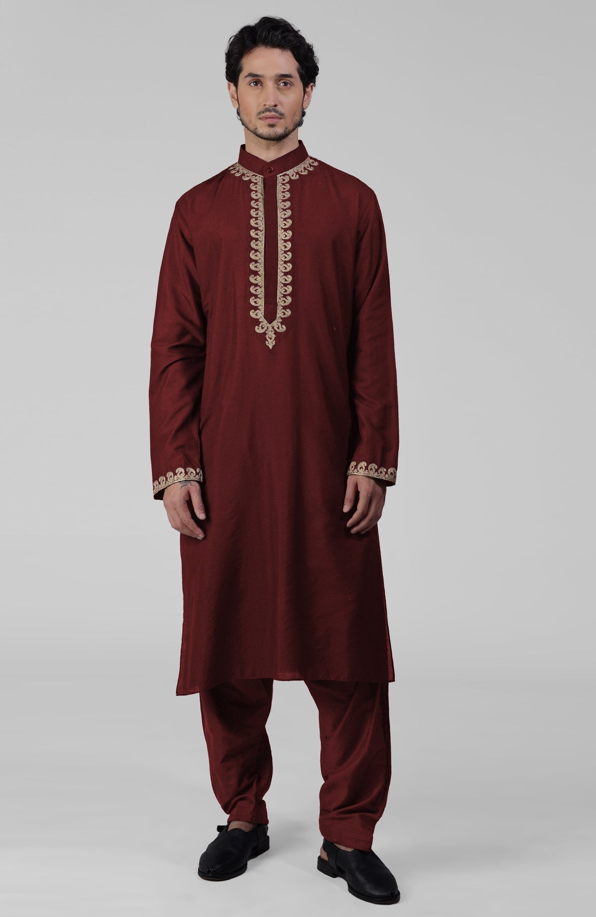 Teal silk kurta set with gold Kashmiri tilla embroidery and matching pathani salwar.