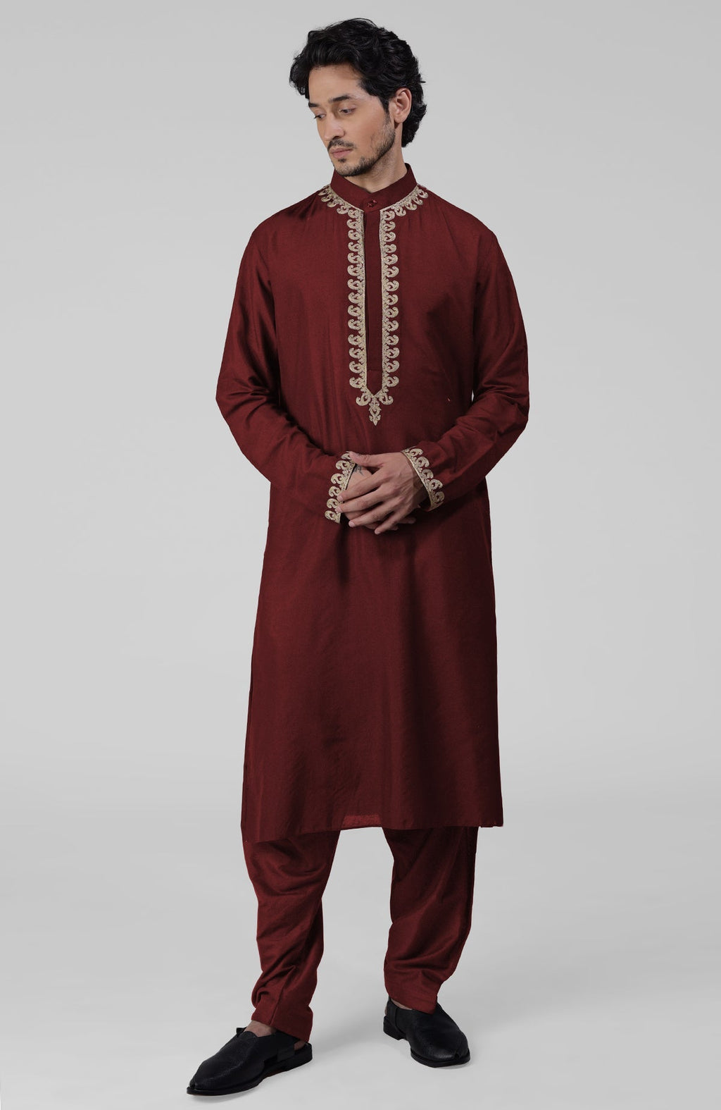 Maroon silk kurta set with intricate gold Kashmiri Tilla hand embroidery and matching salwar.