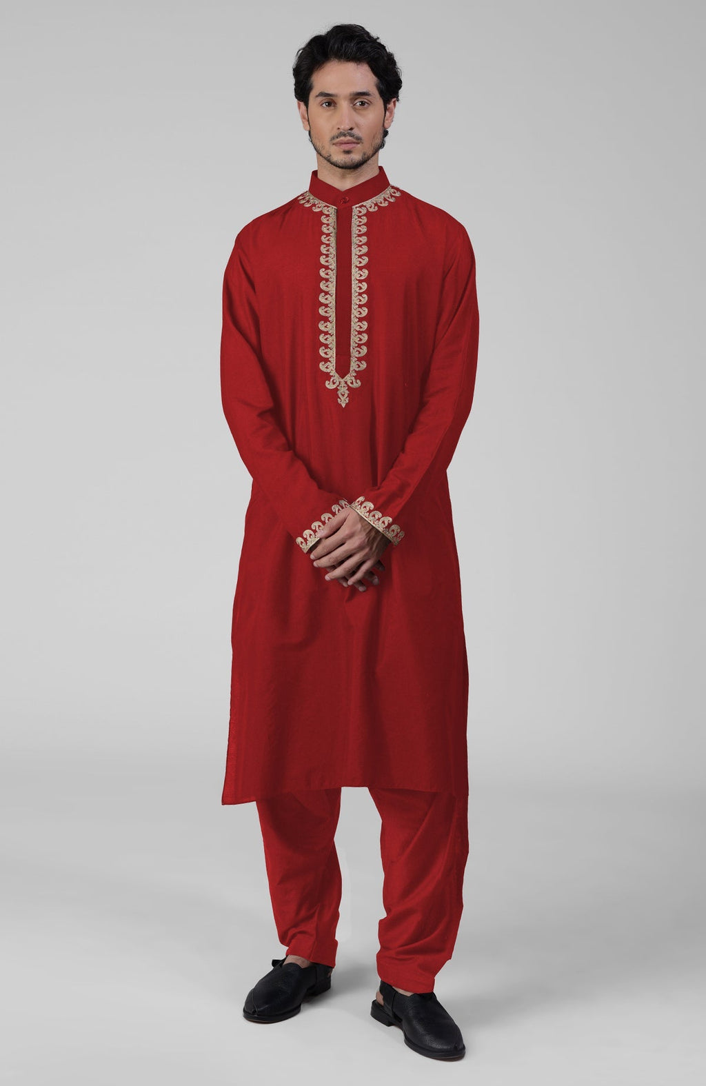 Red silk kurta set with intricate gold Kashmiri tilla embroidery and matching pathani salwar.