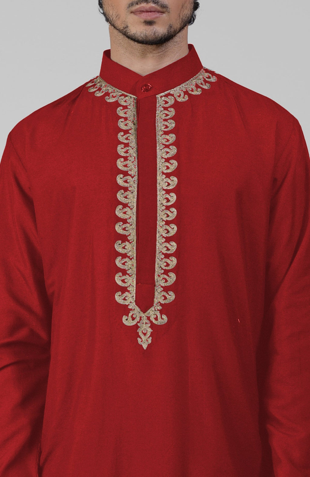 Red silk kurta set with gold Kashmiri tilla hand embroidery and matching pathani salwar.