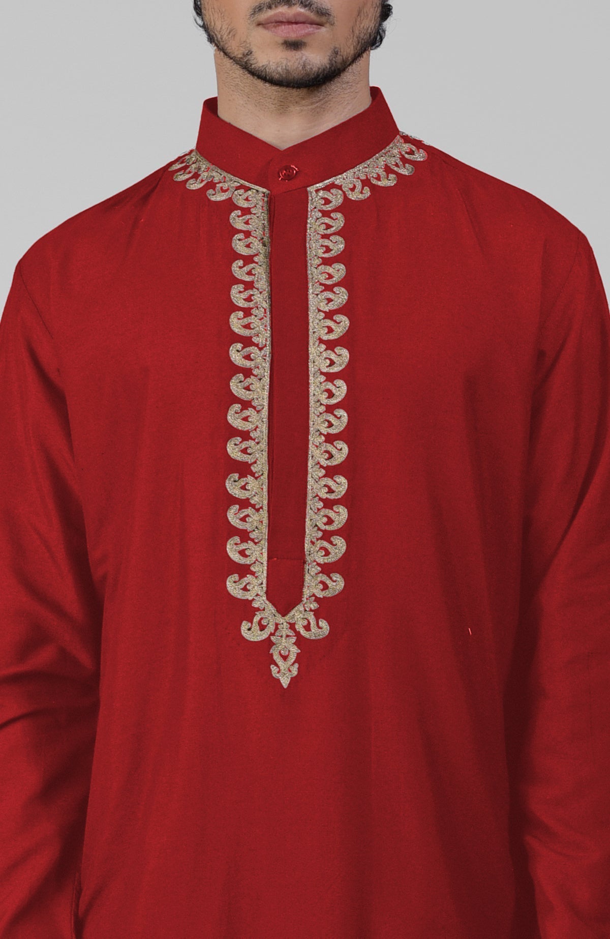 Red silk kurta set with gold Kashmiri tilla hand embroidery and matching pathani salwar.