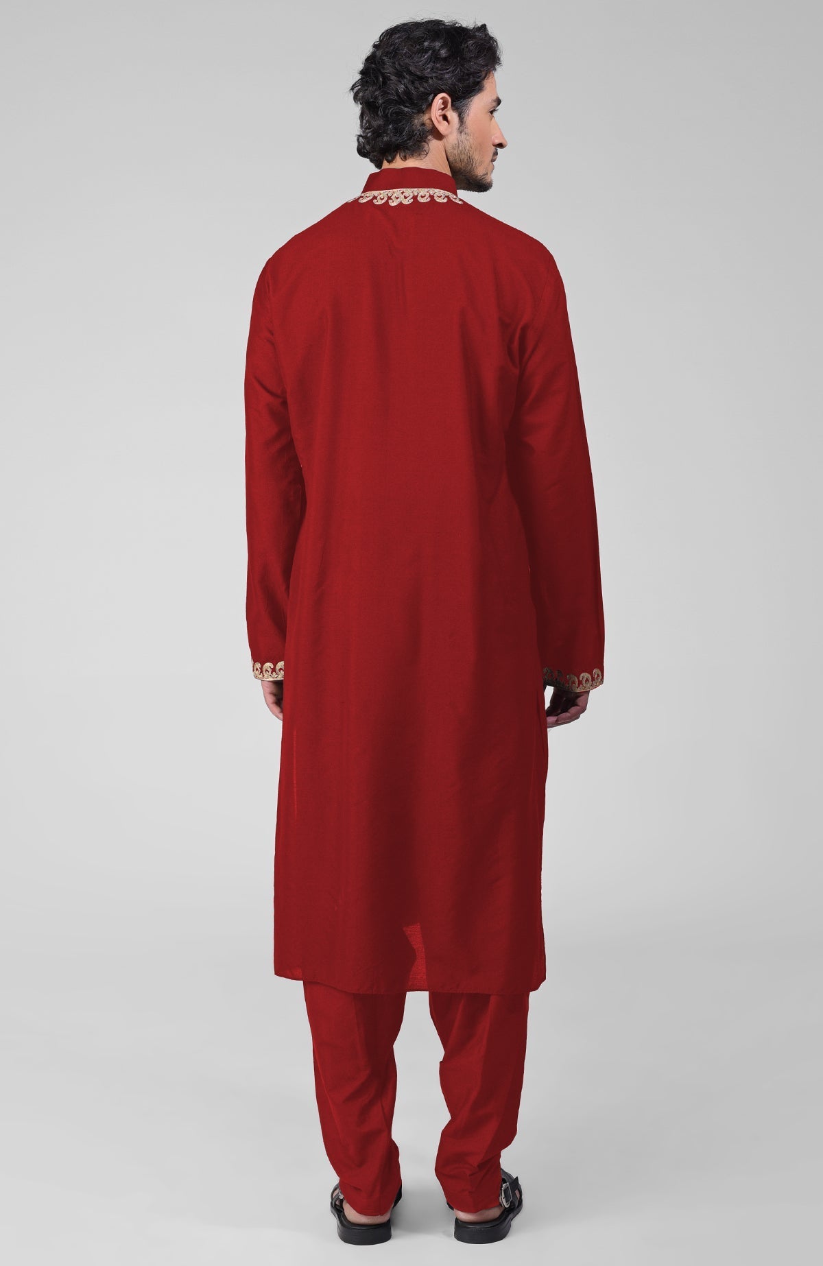 Red silk kurta set with gold Kashmiri tilla hand embroidery and matching pathani salwar.