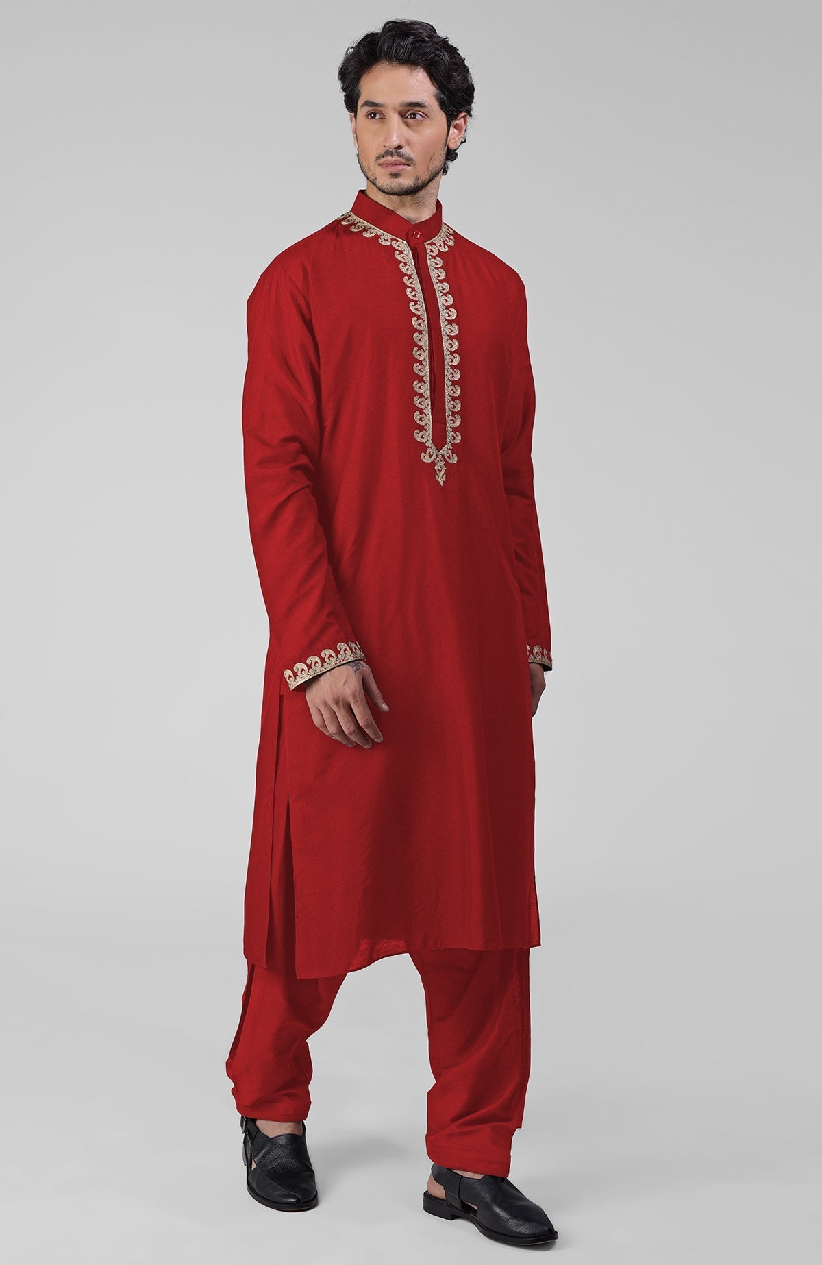 Red silk kurta set with gold Kashmiri tilla embroidery and matching pathani salwar.