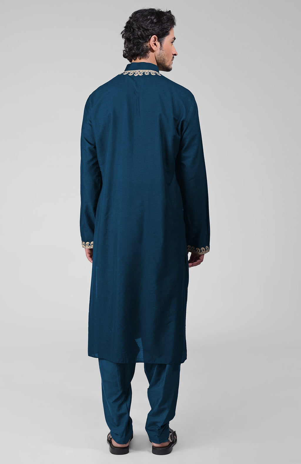 Teal silk kurta with gold Kashmiri tilla embroidery and matching pathani salwar set.