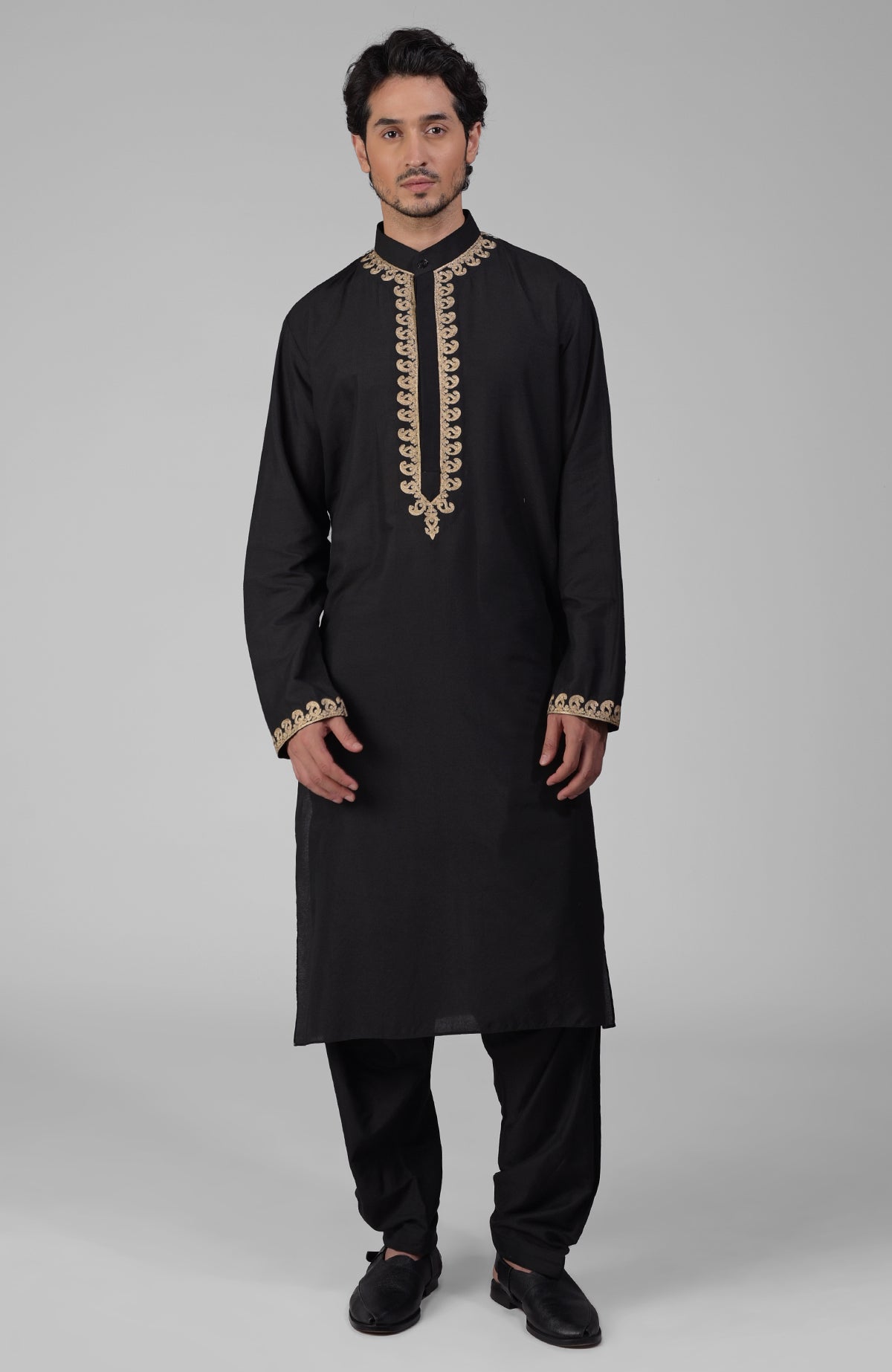 Navy blue silk kurta with gold Kashmiri tilla embroidery and matching pathani salwar.