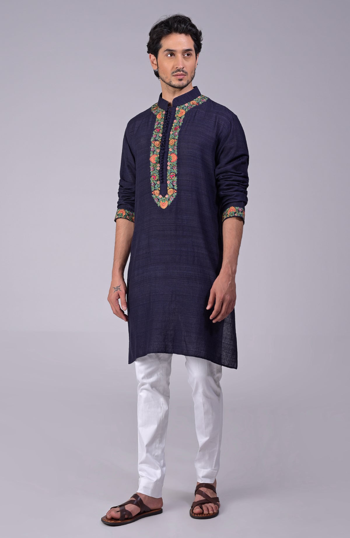 Eclipse blue kurta with Kashidakari embroidery on placket, neckline, and sleeves.