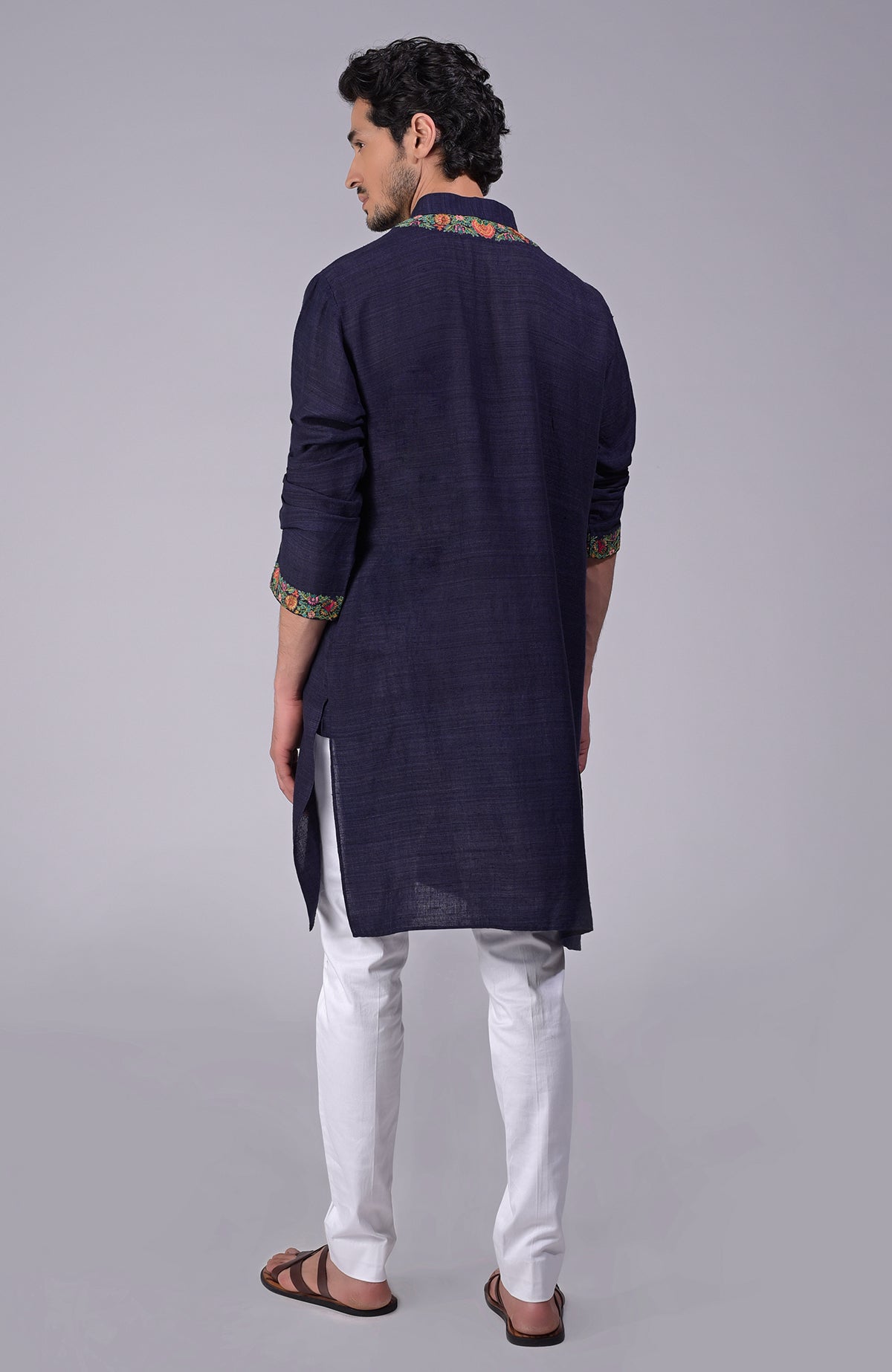 Eclipse blue kurta with Kashidakari embroidery on placket, neckline, and sleeves.