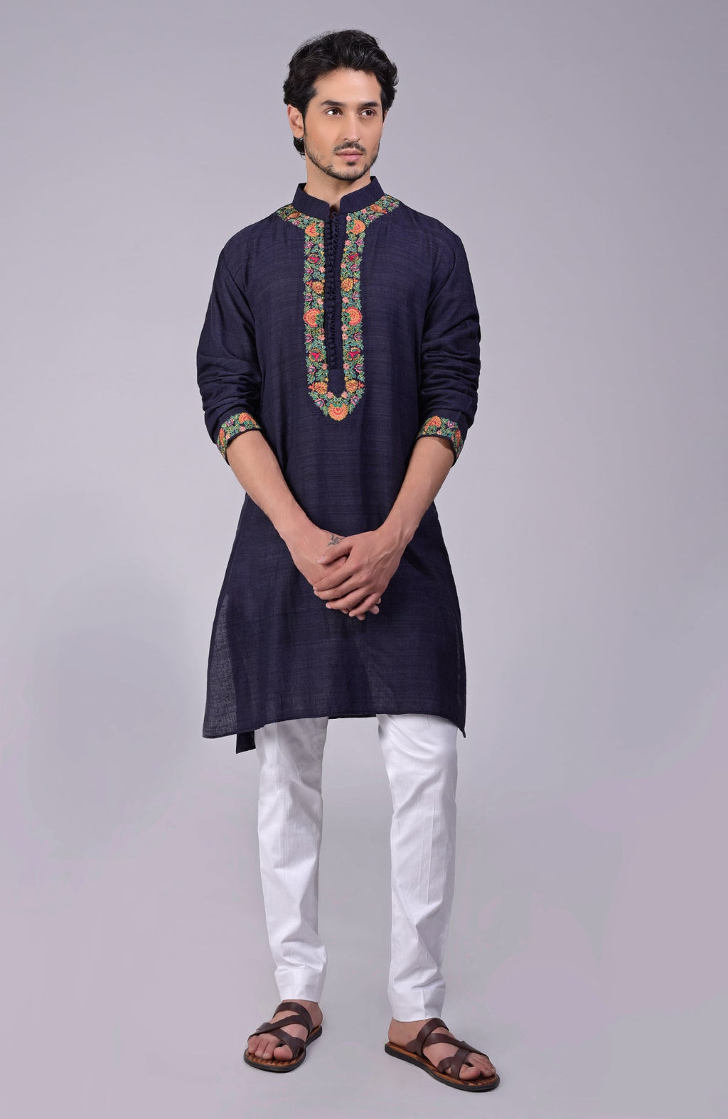 Eclipse blue kurta with Kashidakari embroidery on placket, neckline, and sleeves.