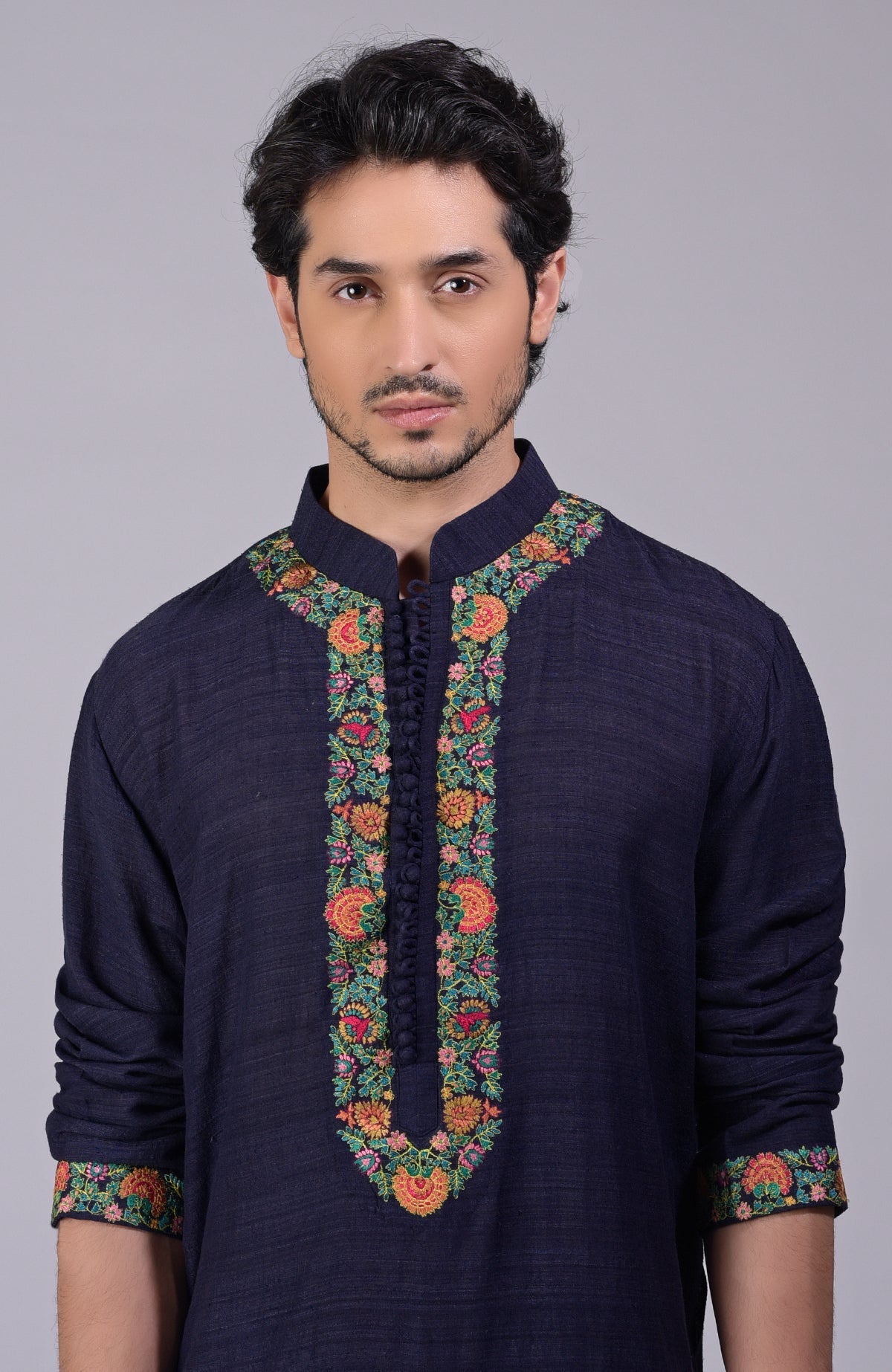 Eclipse blue kurta with Kashidakari embroidery on placket, neckline, and sleeves.