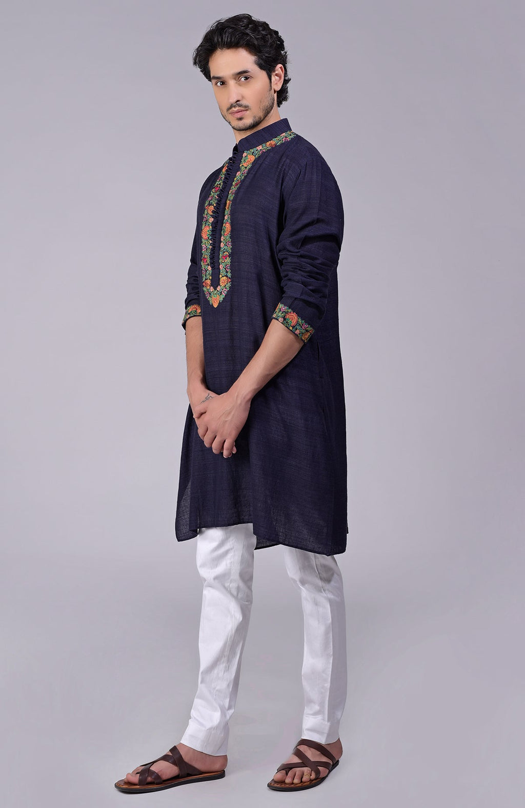 Eclipse blue kurta with multicolor Kashidakari embroidery on placket, neckline, and sleeves.
