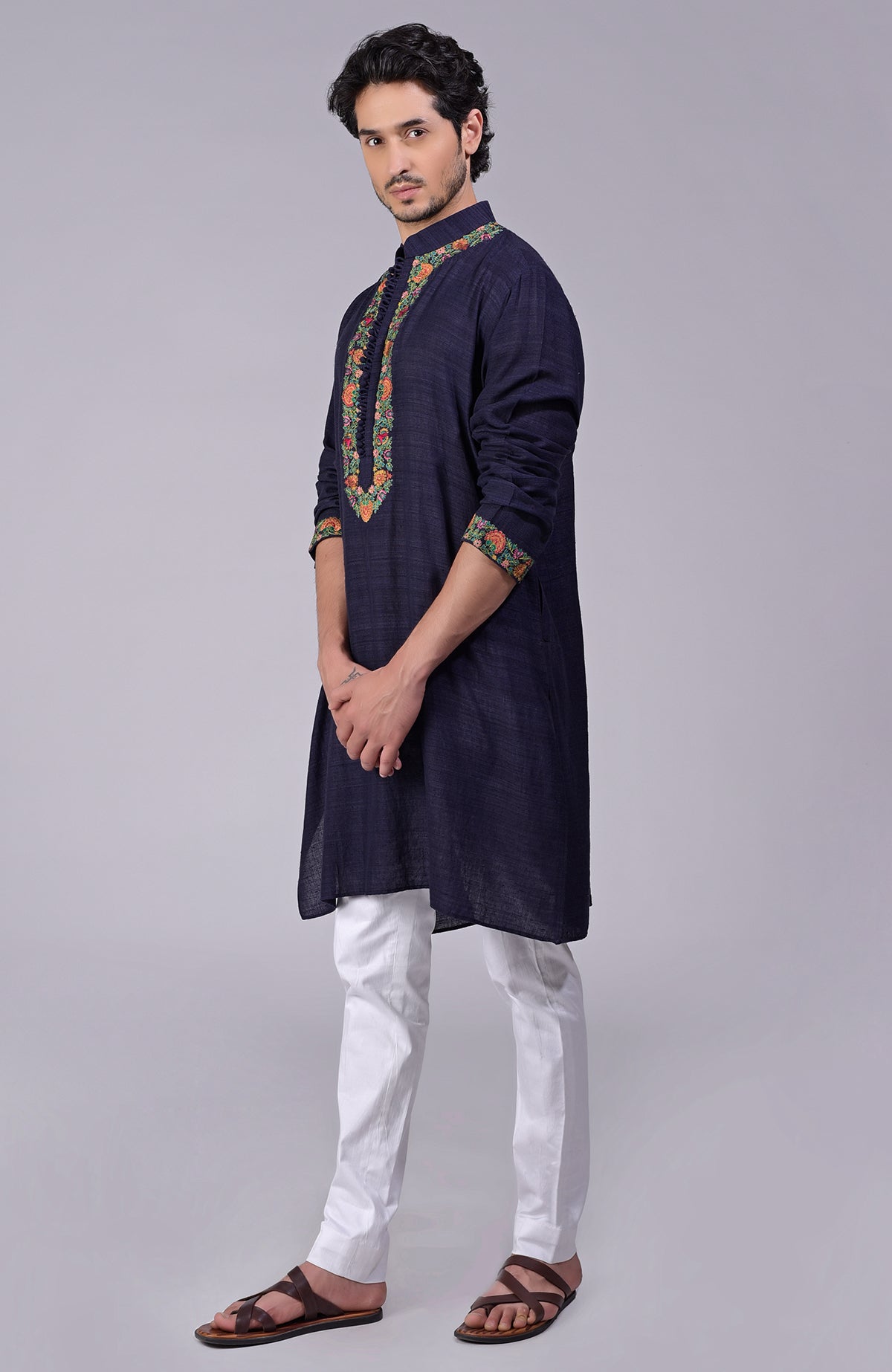 Eclipse blue kurta with multicolor Kashidakari embroidery on placket, neckline, and sleeves.
