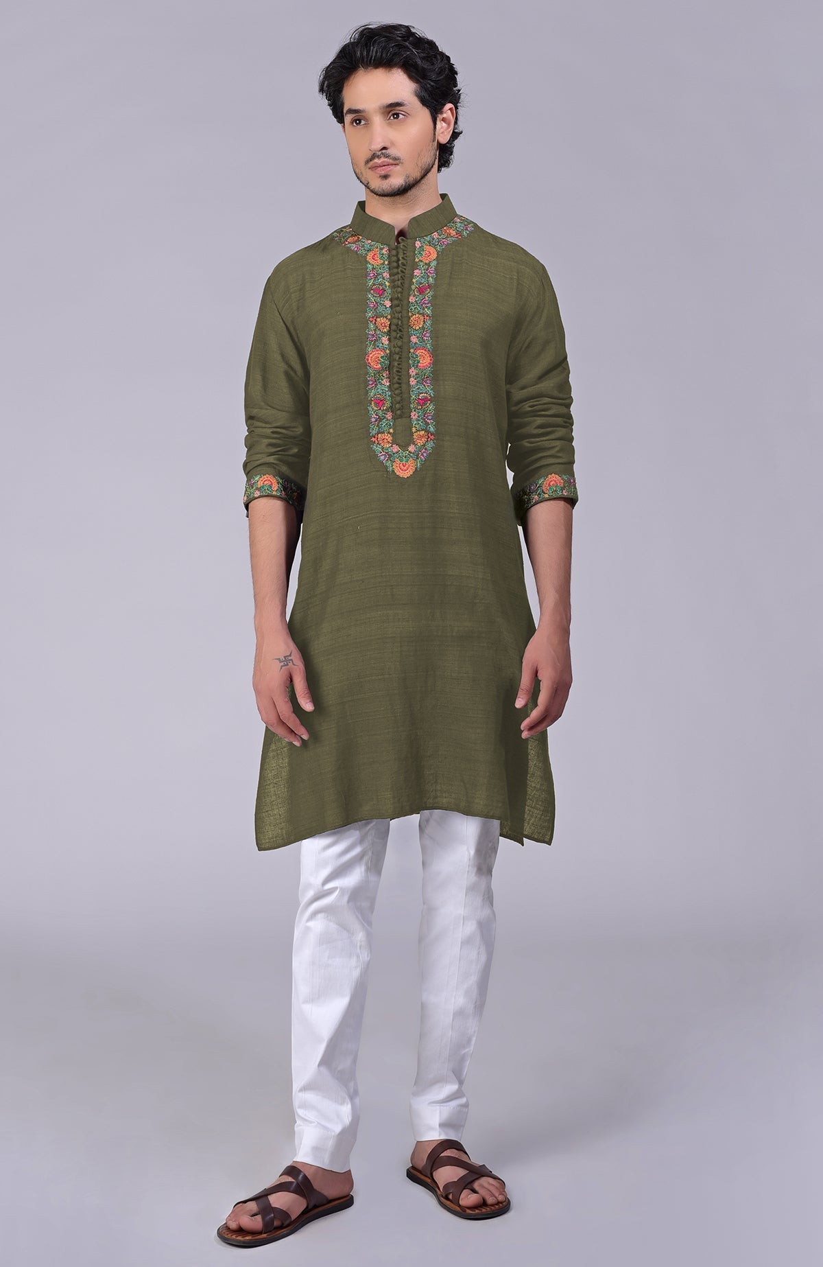 Eclipse blue kurta with Kashidakari embroidery on placket, neckline, and sleeves.