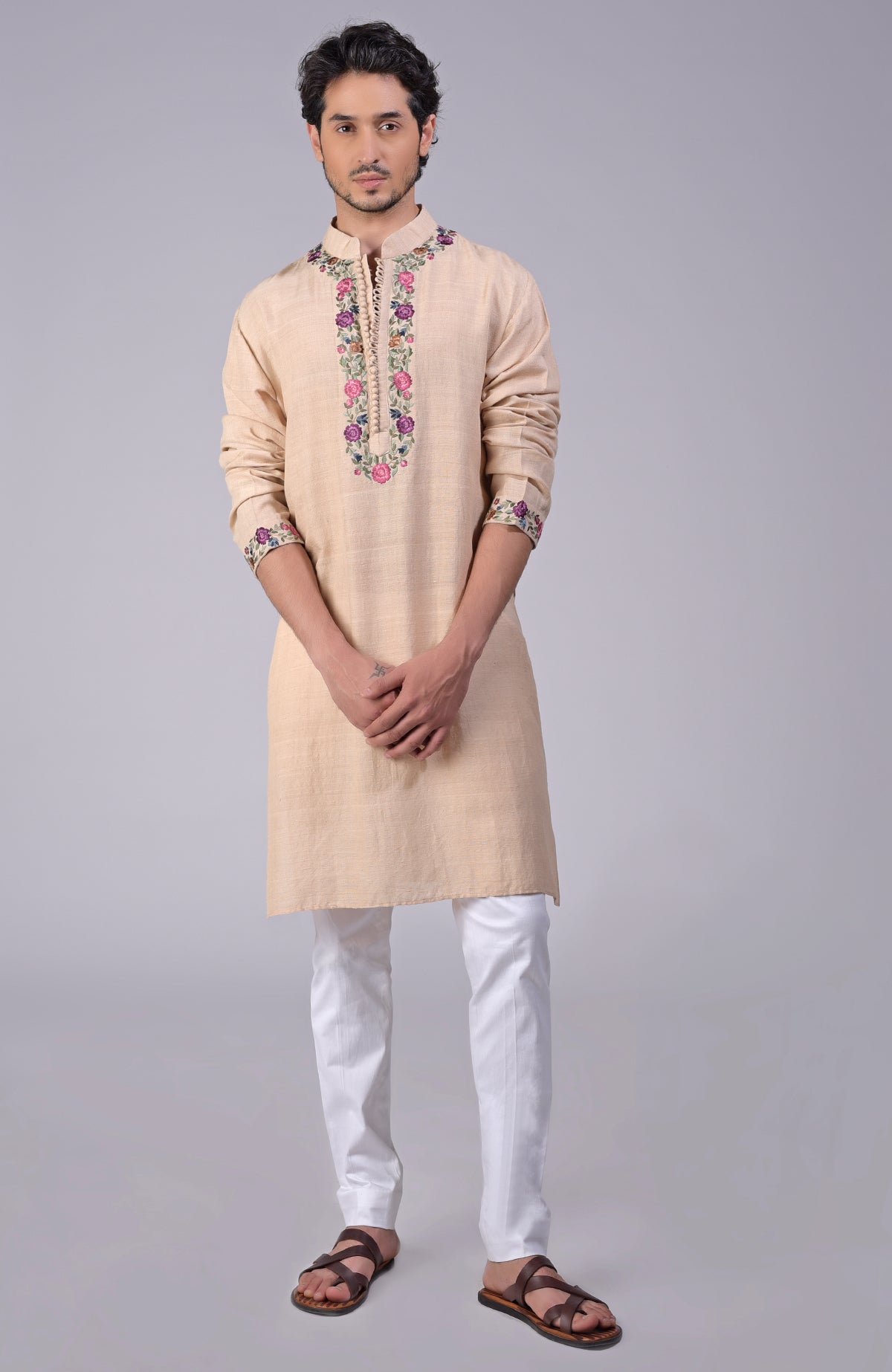 Beige kurta with Parsi Gara embroidery on placket, neckline, and sleeves with loop buttons