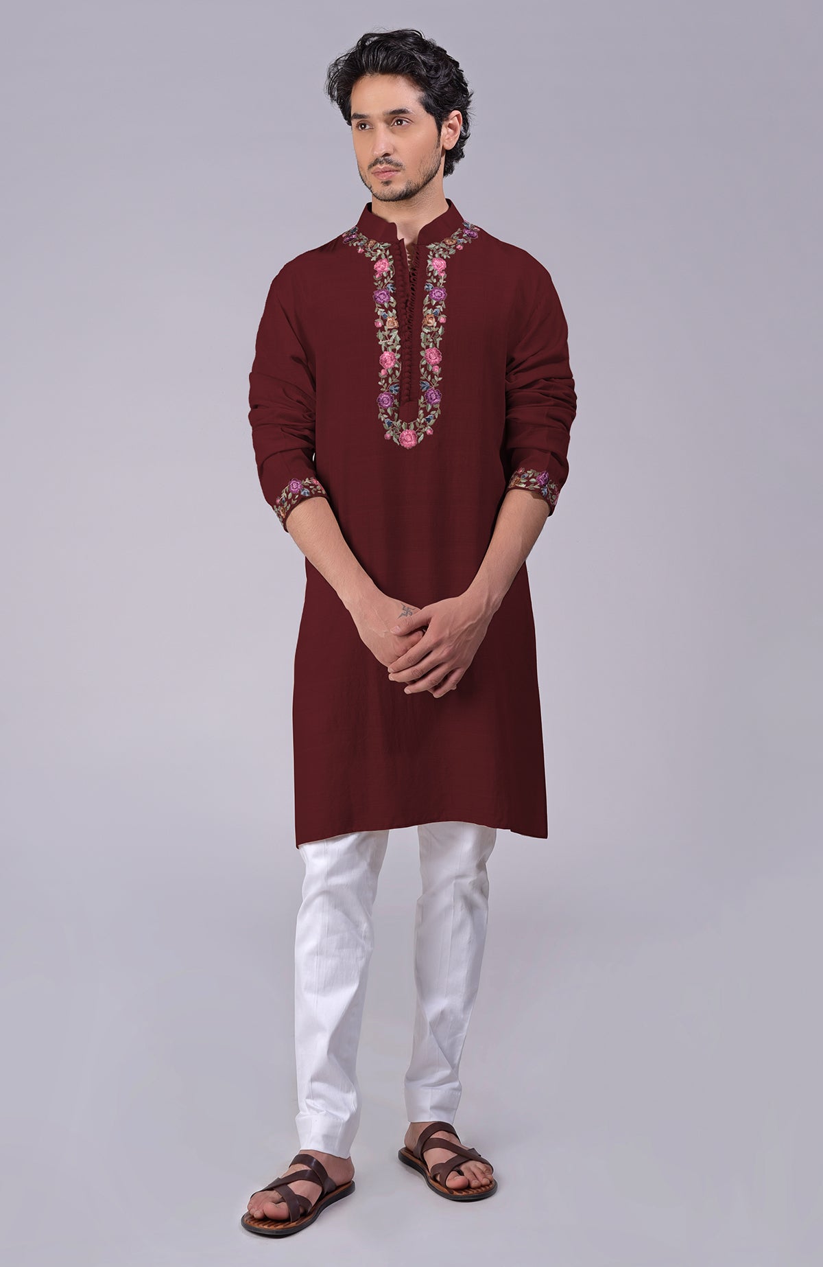Misted marigold yellow kurta with Parsi Gara embroidery on placket, neckline, and sleeves.