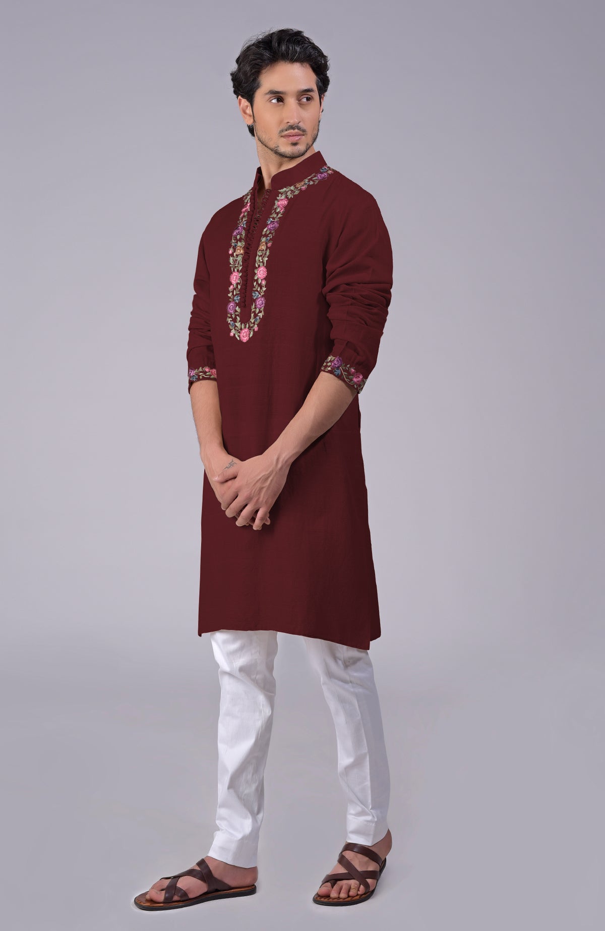 Maroon kurta with Parsi Gara embroidery on placket, neckline, and sleeves, loop button closure