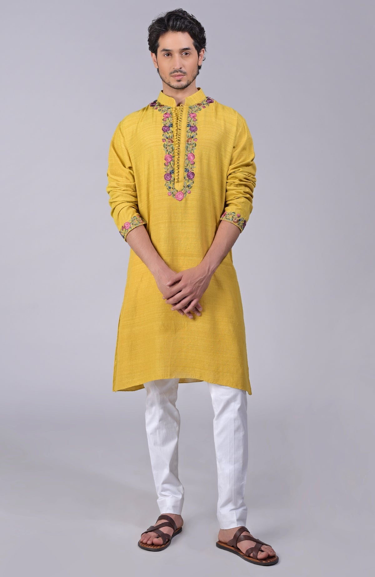 Misted marigold yellow kurta with Parsi Gara embroidery on placket, neckline, and sleeves.