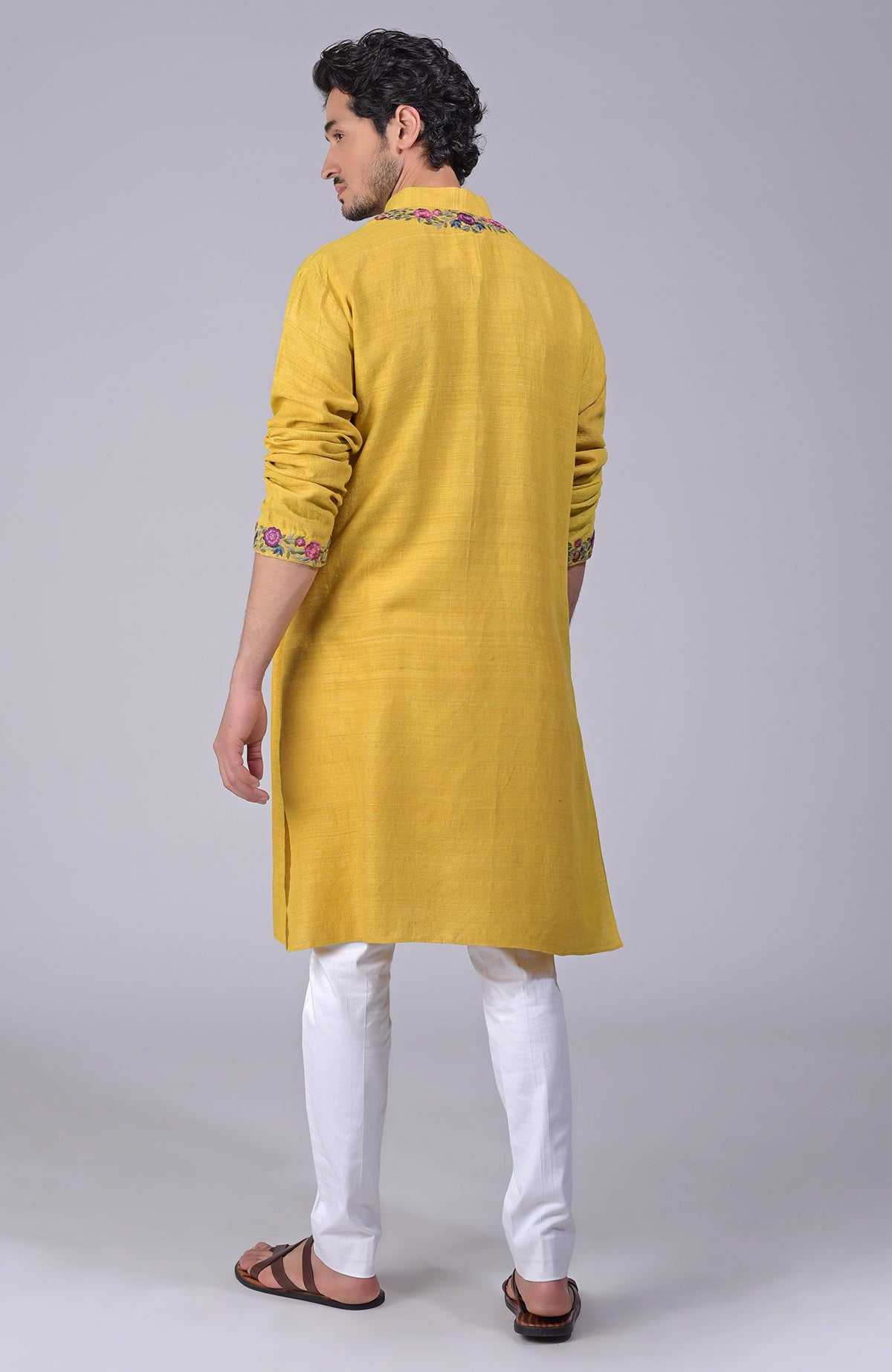 Misted marigold yellow kurta with Parsi Gara embroidery on placket, neckline, and sleeves.