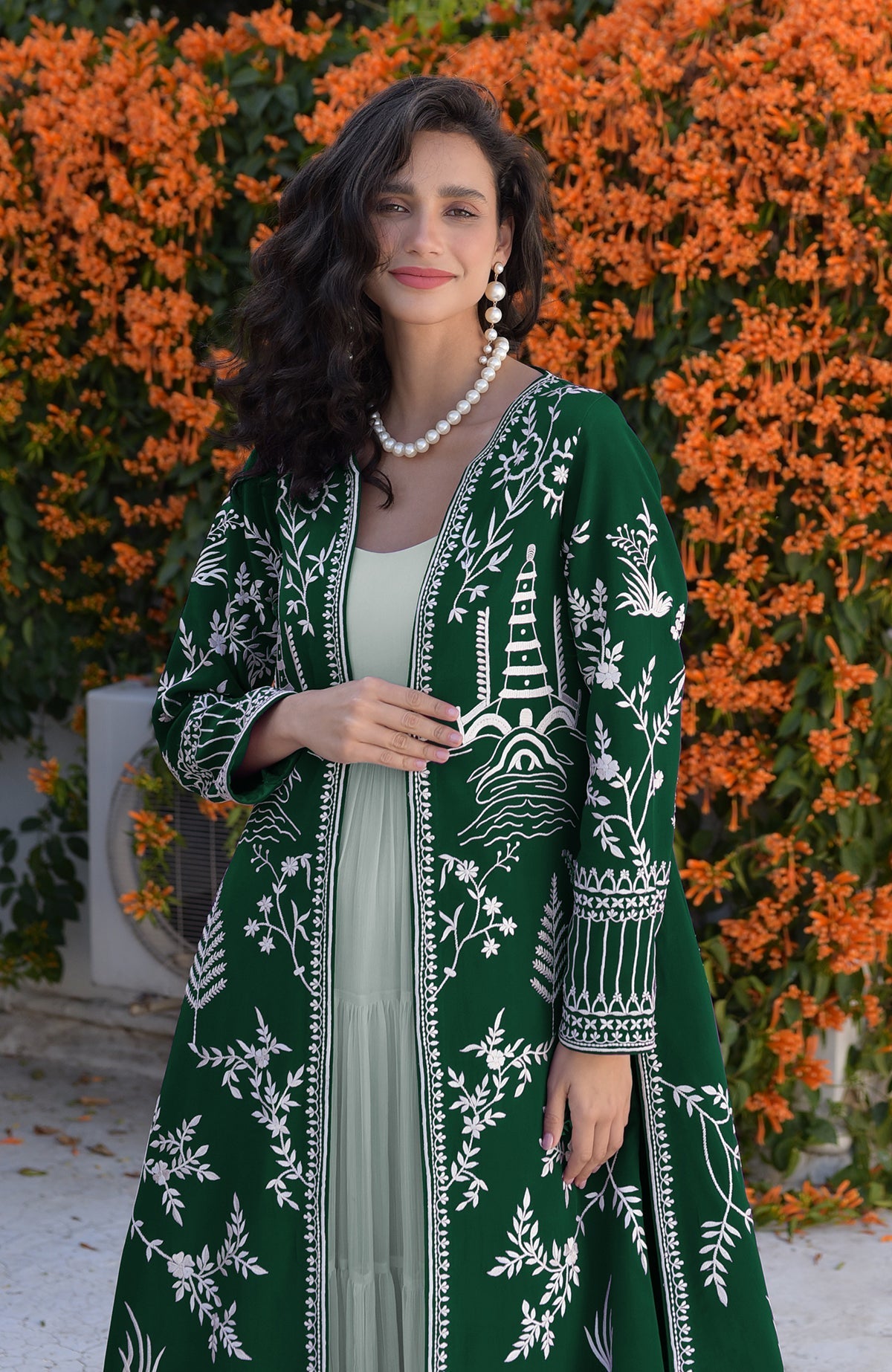 Navy blue jacket with ivory Parsi Gara embroidery and detailed borders on hems and sleeves