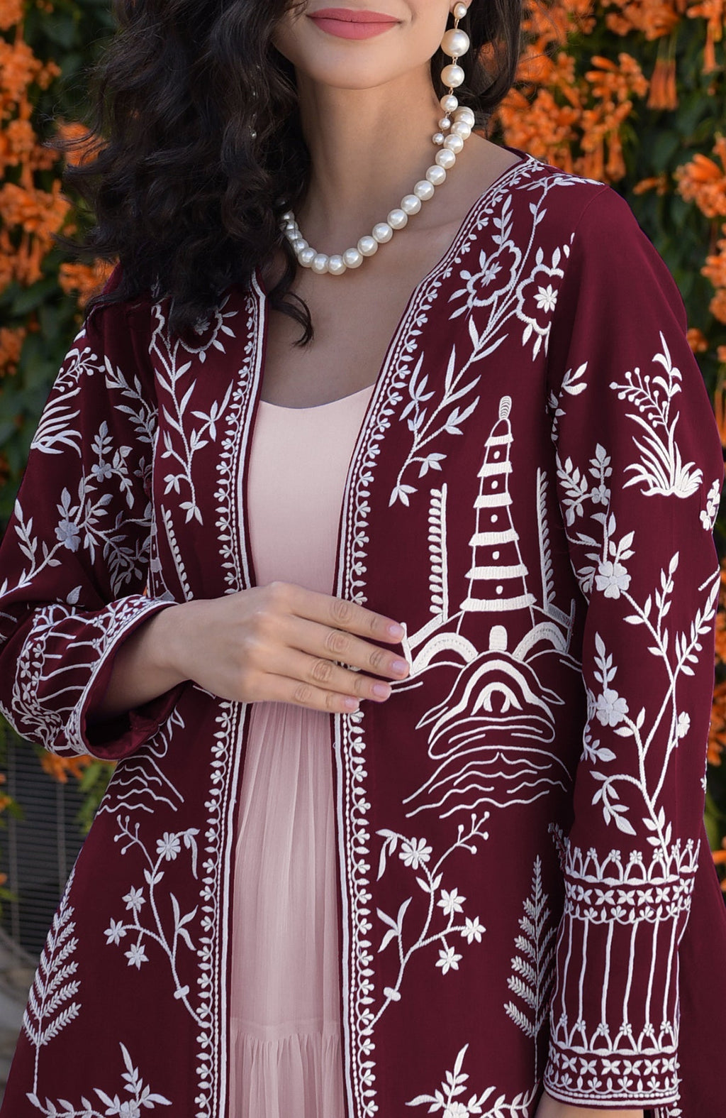 Maroon jacket with ivory Parsi Gara embroidery and detailed borders on hems and sleeves