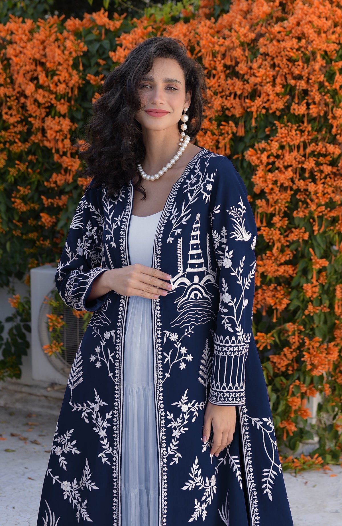 Purple jacket with ivory Parsi Gara embroidery and detailed borders on hems, sleeves, and placket