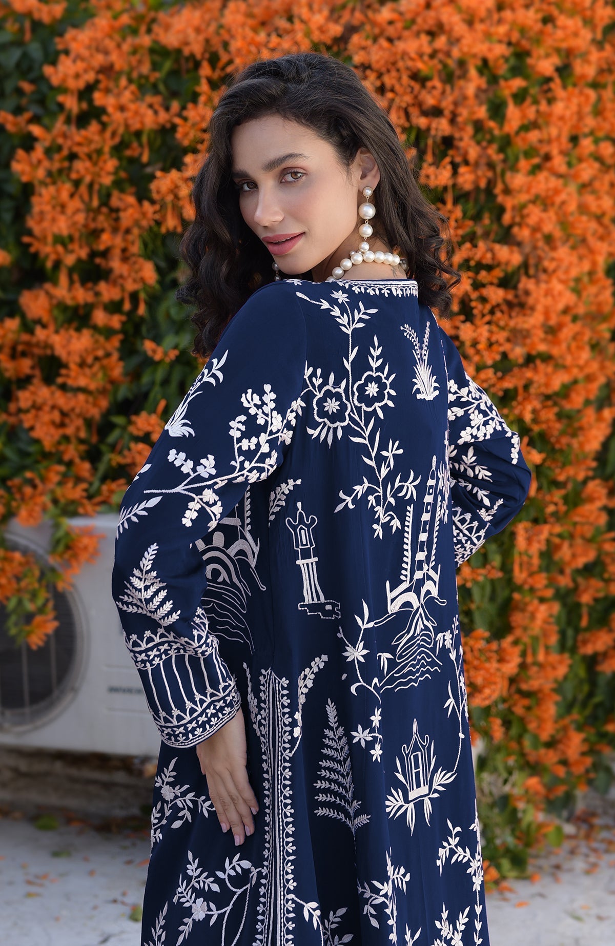 Navy blue jacket with ivory Parsi Gara embroidery and detailed borders on hems and sleeves